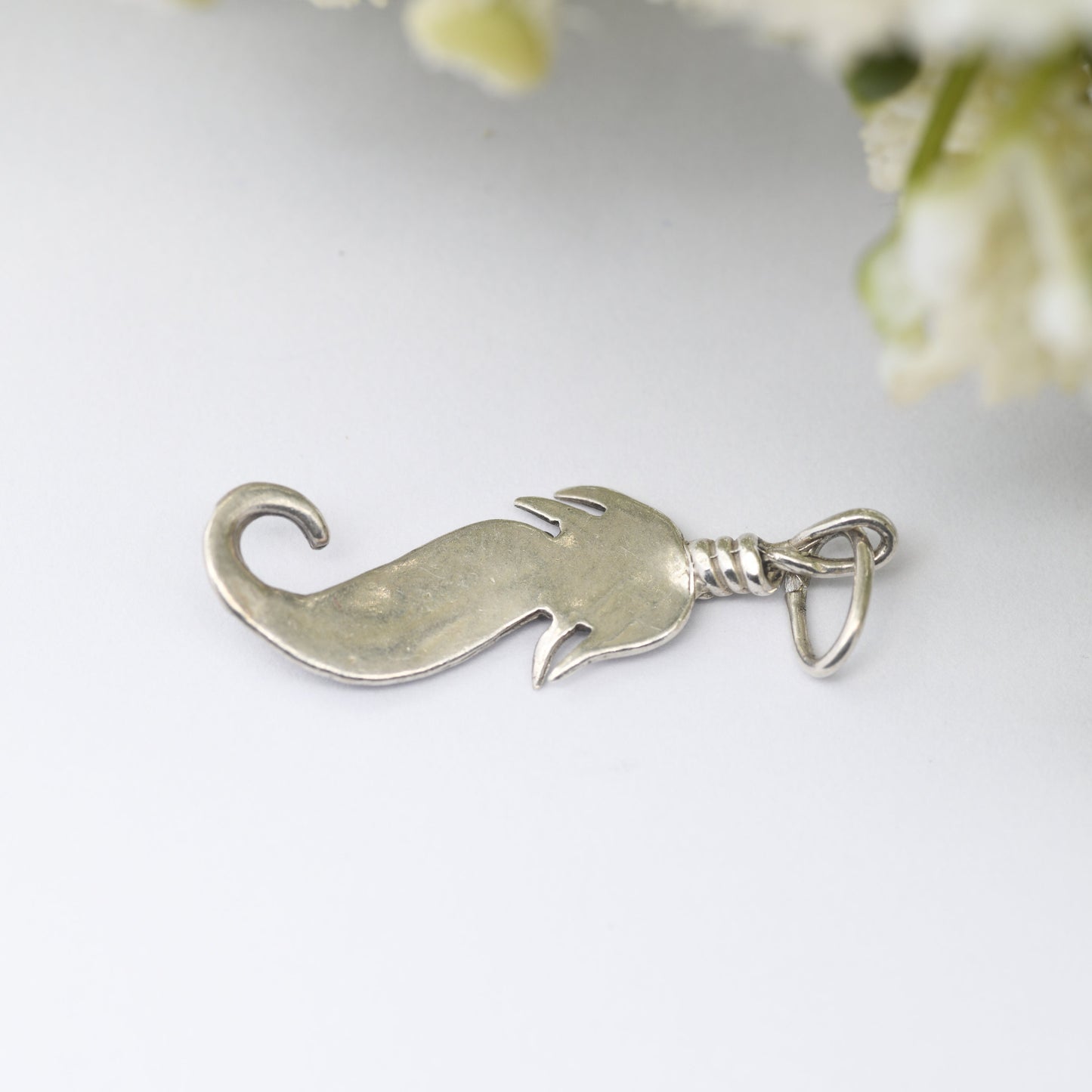 Vintage Navajo Silver Feather Charm Pendant - Spiritual Symbol of Power and Freedom | Twisted Bird's Feather