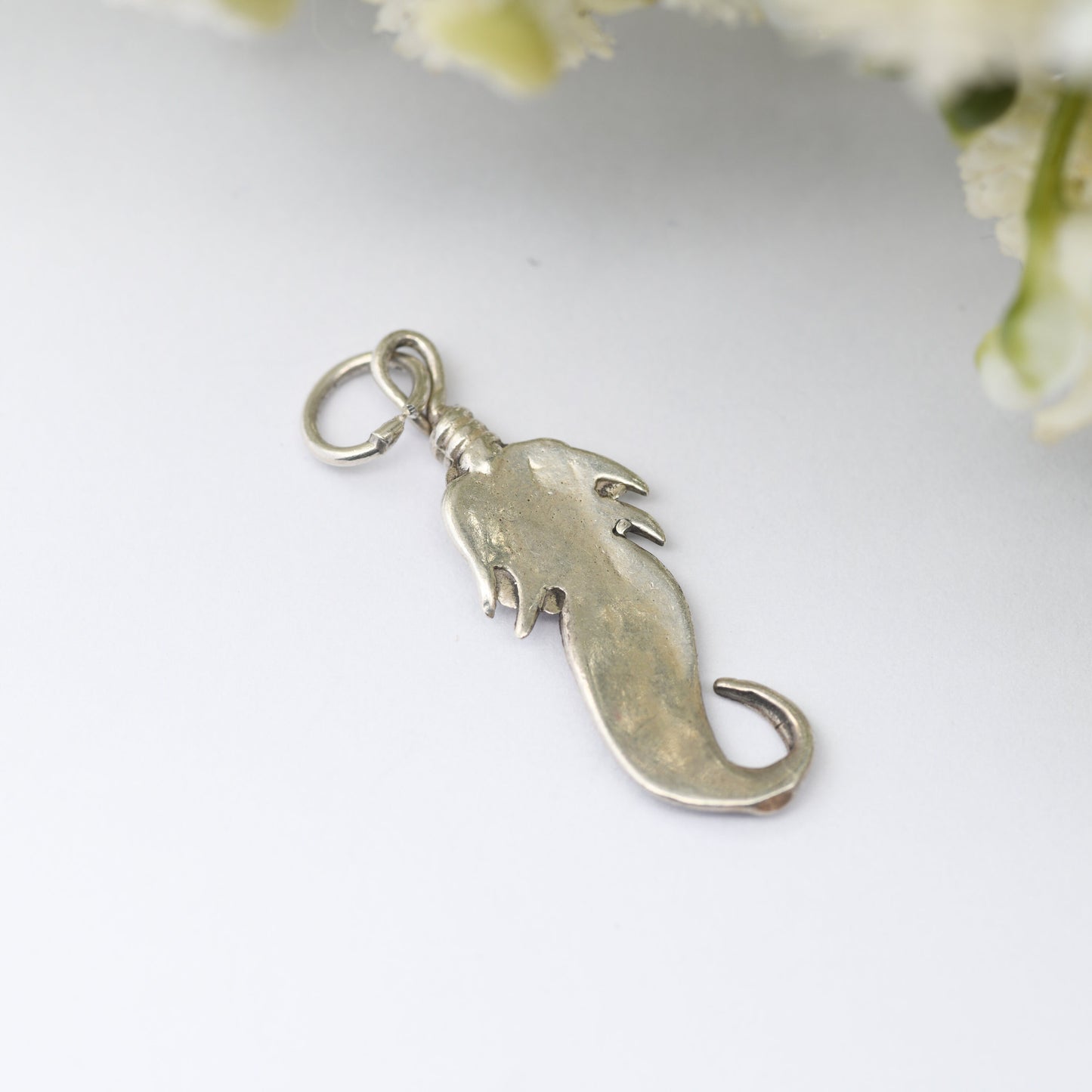 Vintage Navajo Silver Feather Charm Pendant - Spiritual Symbol of Power and Freedom | Twisted Bird's Feather