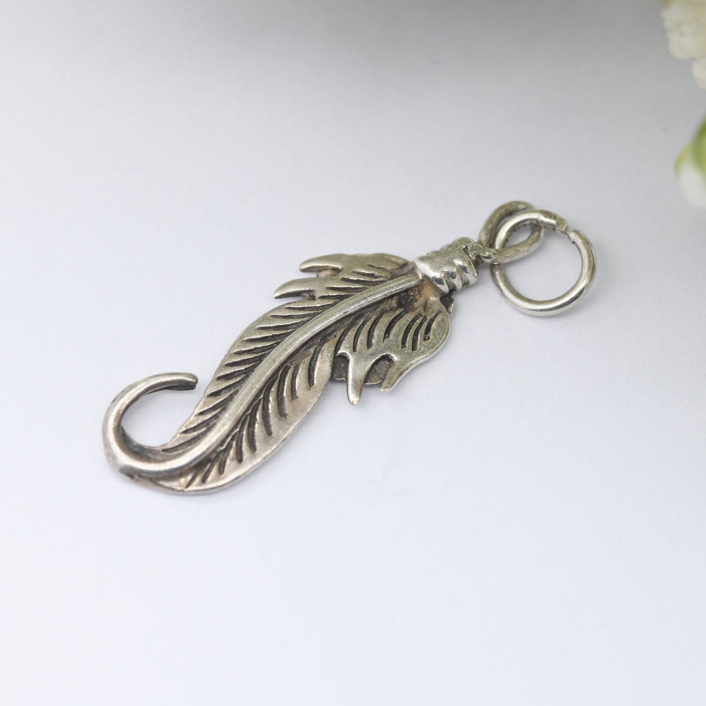Vintage Navajo Silver Feather Charm Pendant - Spiritual Symbol of Power and Freedom | Twisted Bird's Feather