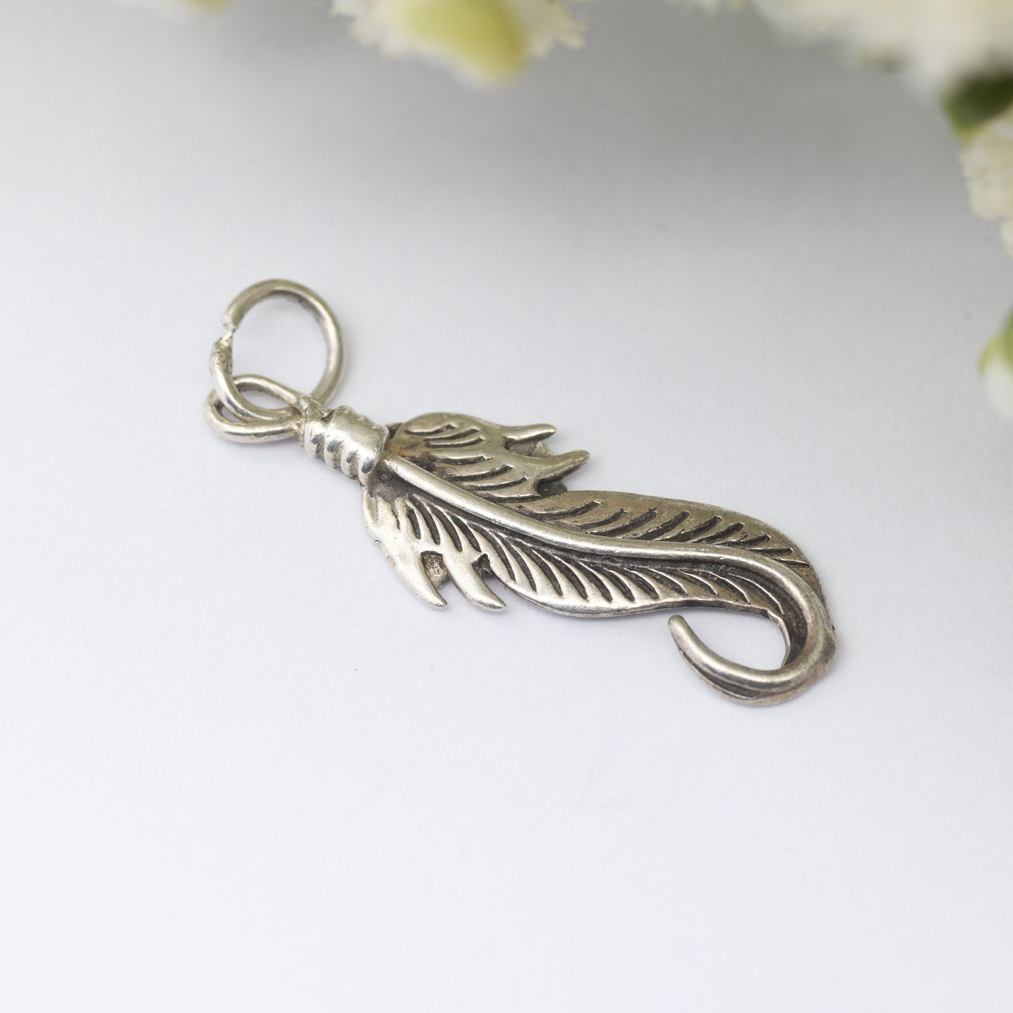 Vintage Navajo Silver Feather Charm Pendant - Spiritual Symbol of Power and Freedom | Twisted Bird's Feather