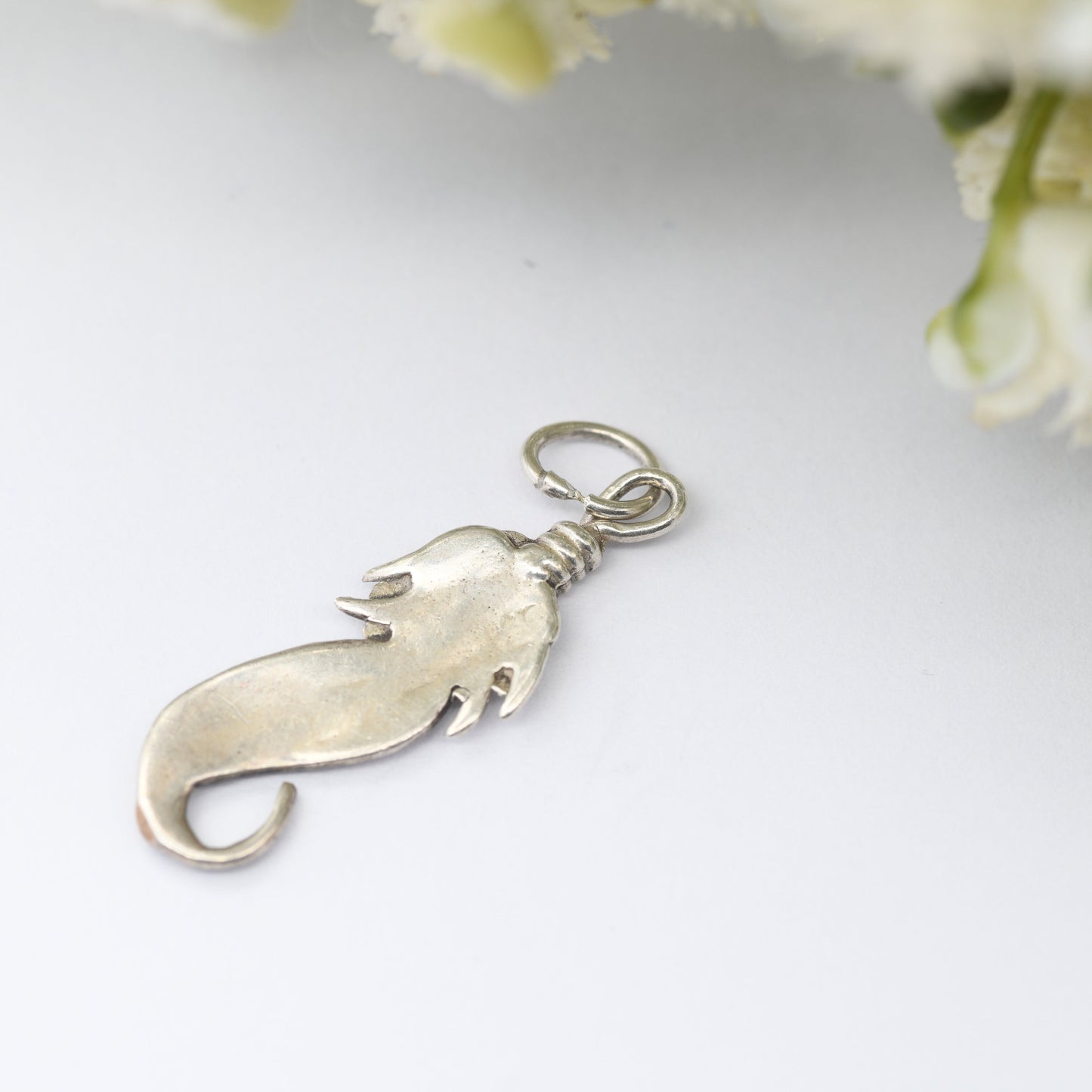 Vintage Navajo Silver Feather Charm Pendant - Spiritual Symbol of Power and Freedom | Twisted Bird's Feather