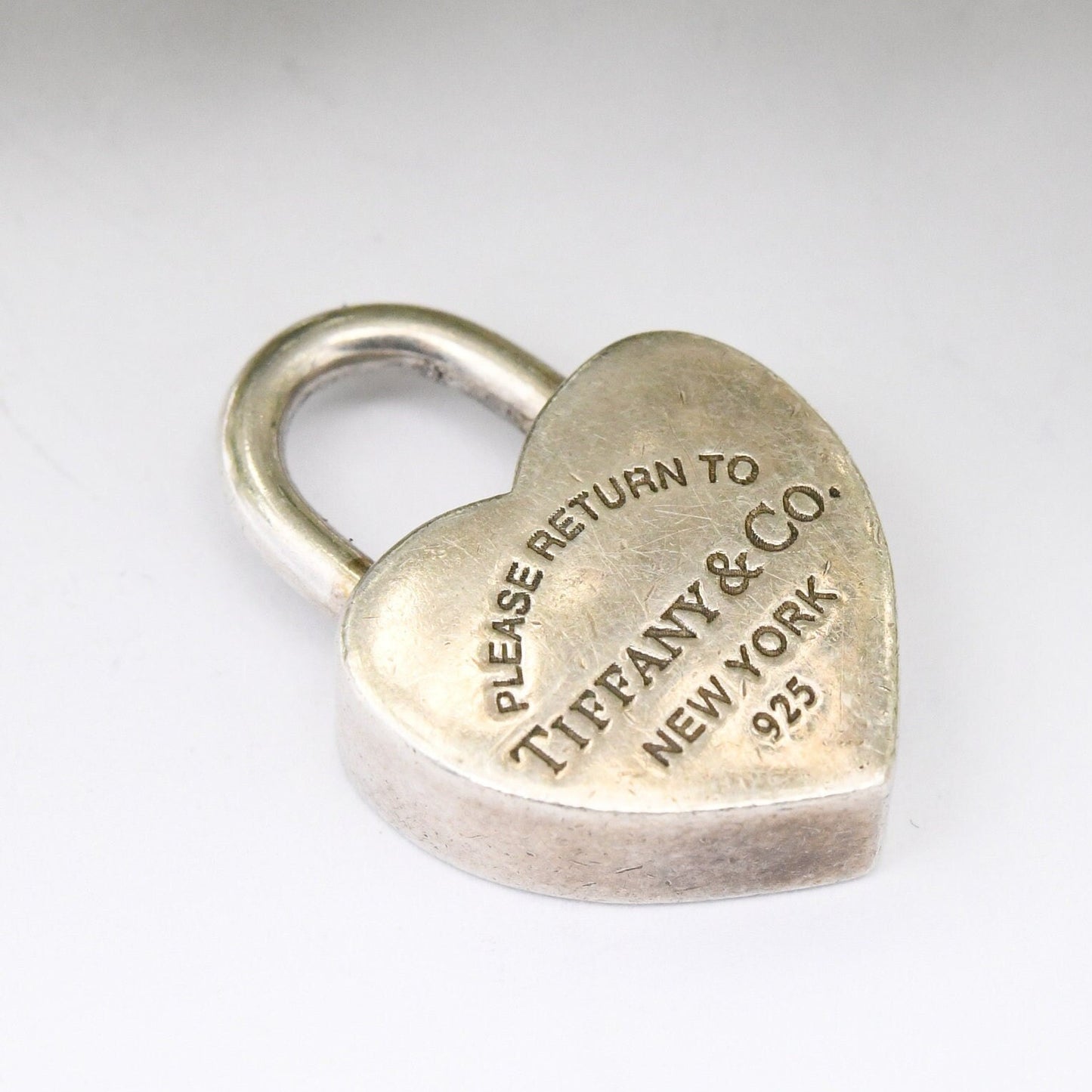 Please Return to Tiffany & Co Heart Padlock Opening Charm Pendant