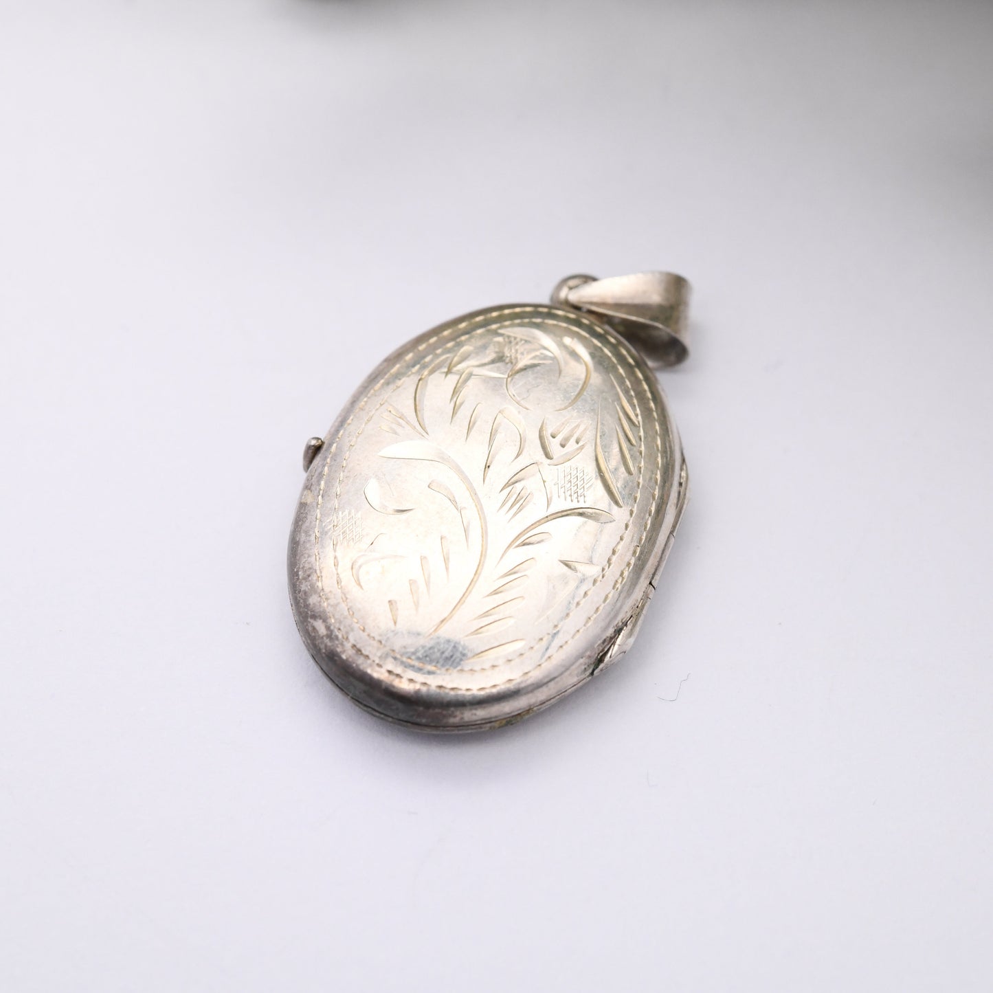 Vintage Sterling Silver Locket Pendant with Engraved Floral Leaf Design