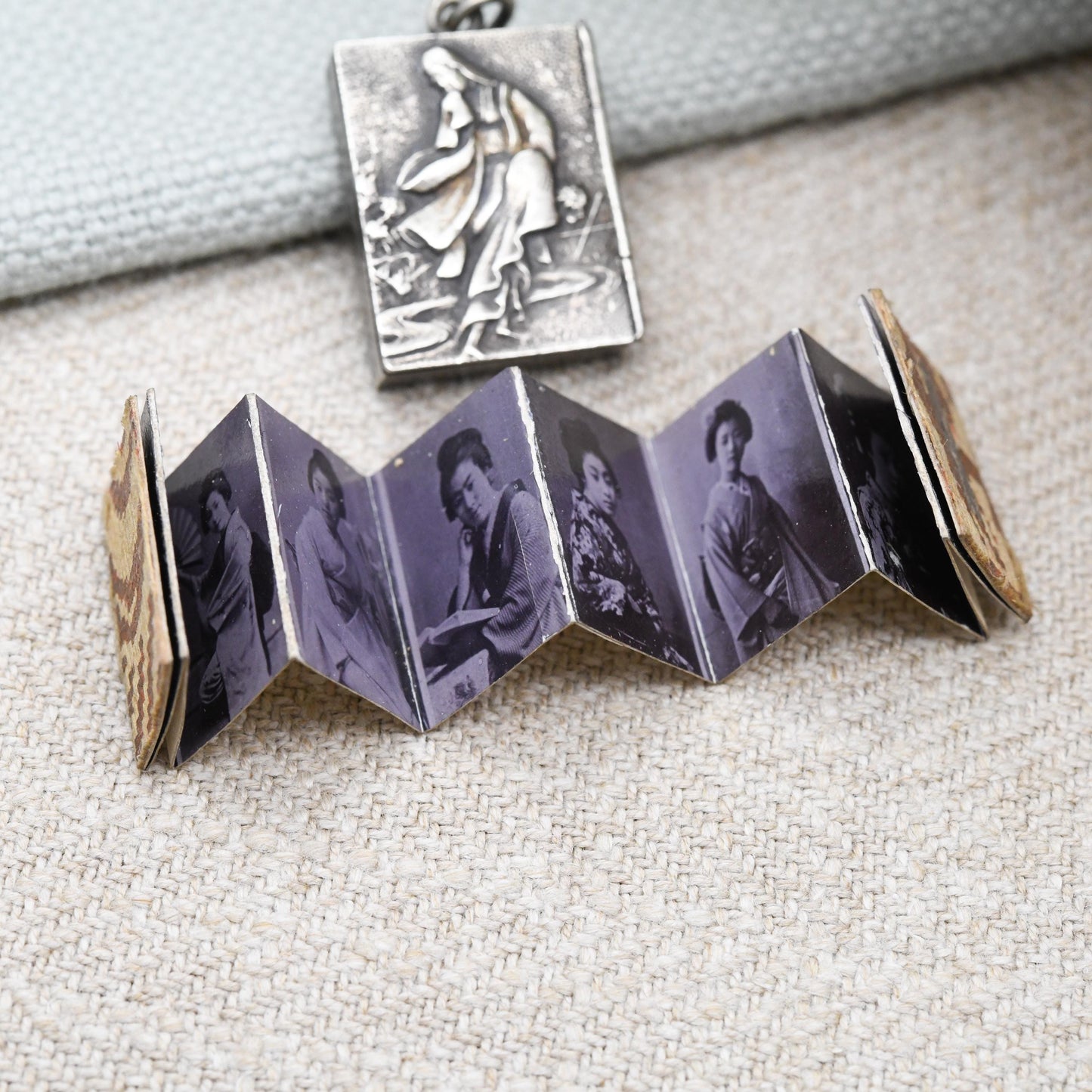 Antique Meiji Japanese Geisha Girl Locket Pendant with Miniature Photo Album Inside - Opening Book Charm with Kimono Girls Early Photographs