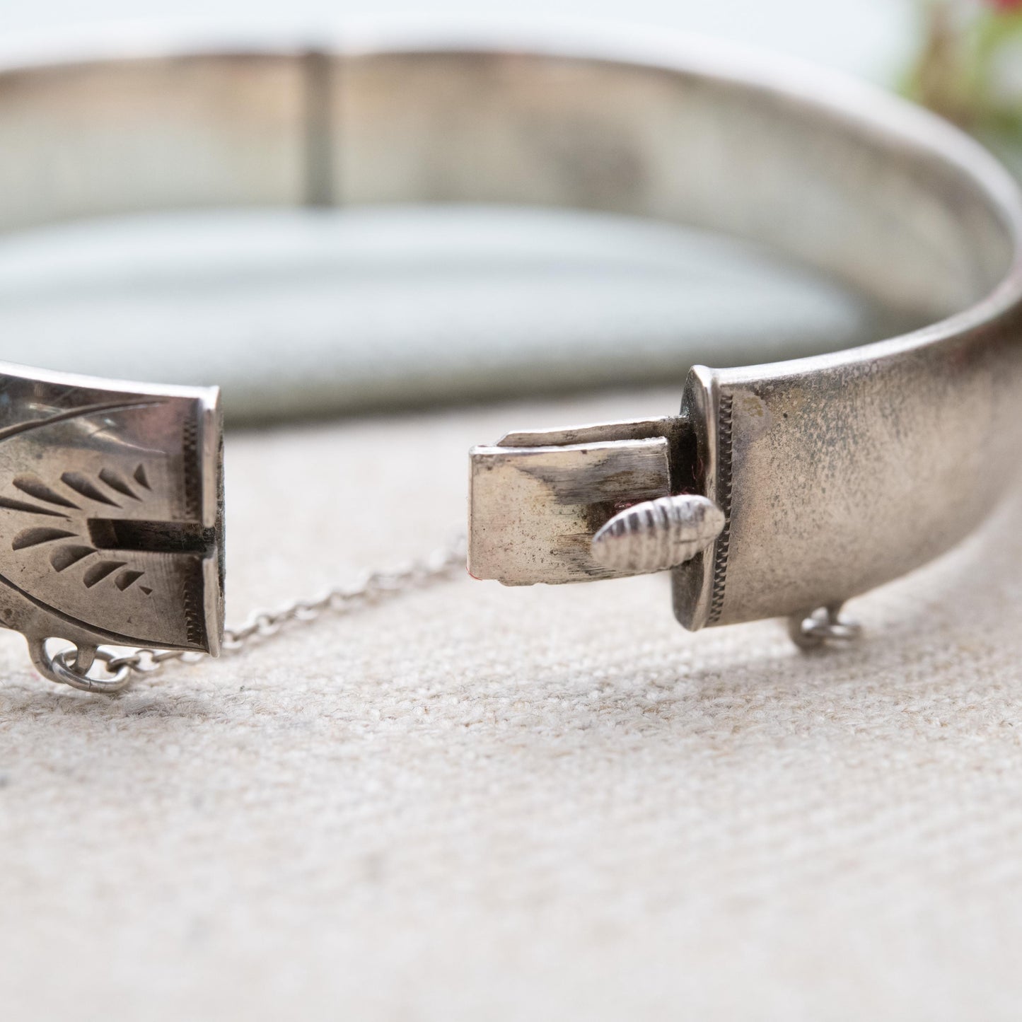 Vintage Sterling Silver Floral Engraved Bangle Bracelet 1966 - Chunky Victorian Aesthetic Scrolling Style with Safety Chain