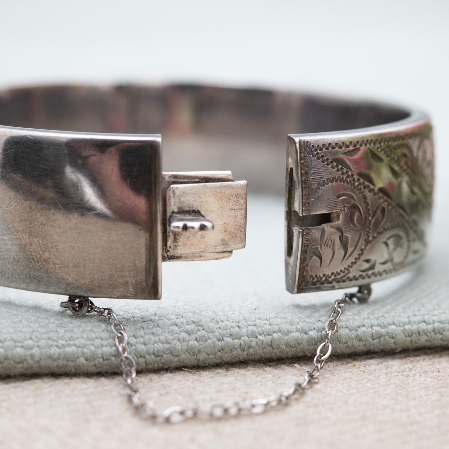 Vintage Sterling Silver Engraved Bangle Bracelet 1959 by KP - Chunky Victorian Aesthetic Scrolling Style with Safety Chain
