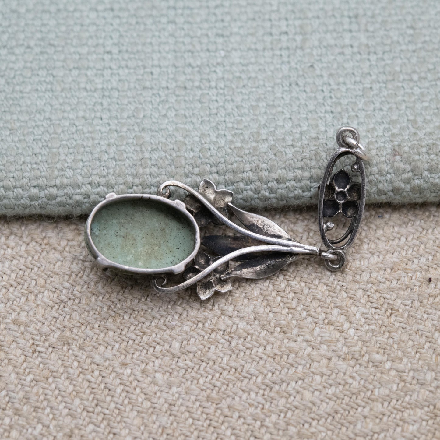 Antique Arts and Crafts Silver Flower Pendant with Green Cabochon Stone c. 1910s
