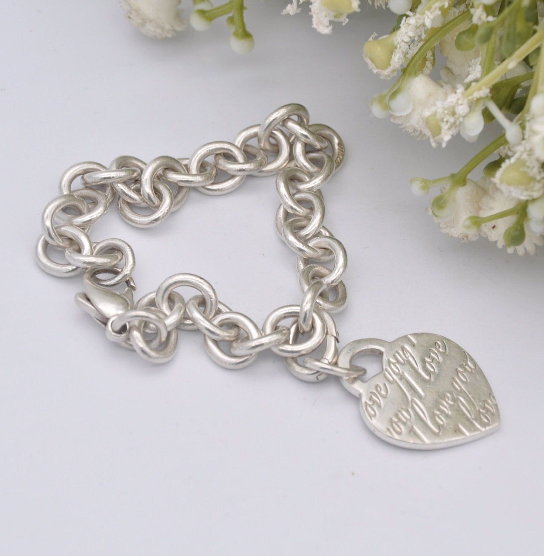 Tiffany & Co Sterling Silver Bracelet with Tiffany Notes I Love You Heart Tag Charm