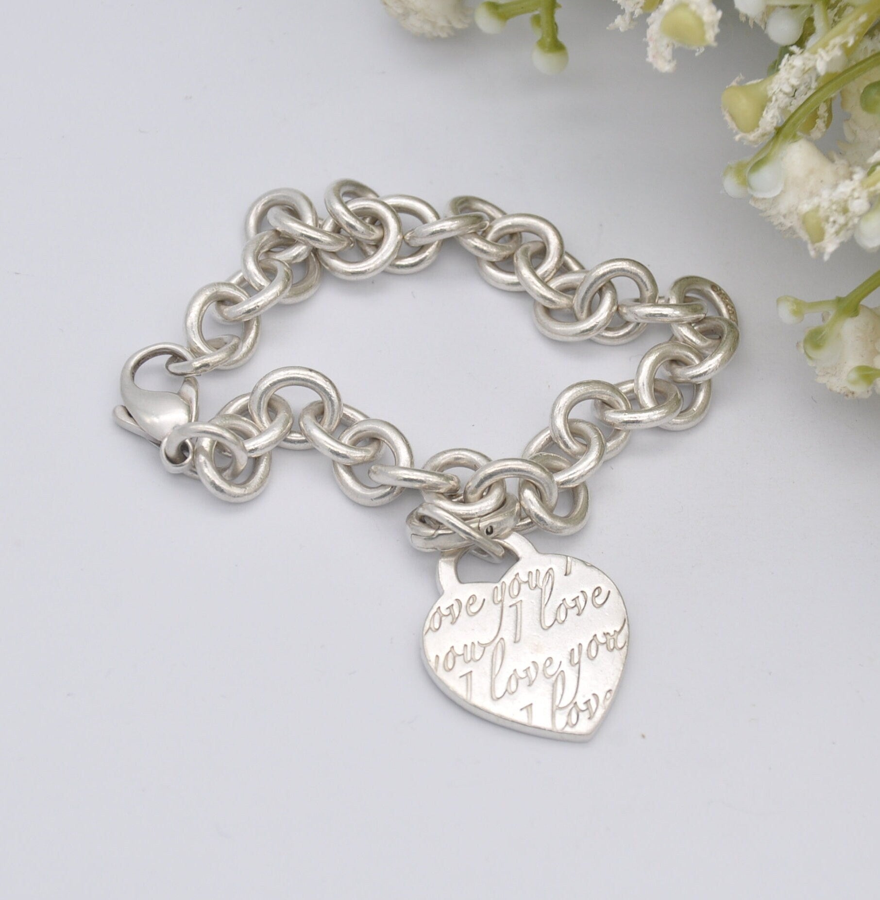Tiffany & Co Sterling Silver Bracelet with Tiffany Notes I Love You Heart Tag Charm