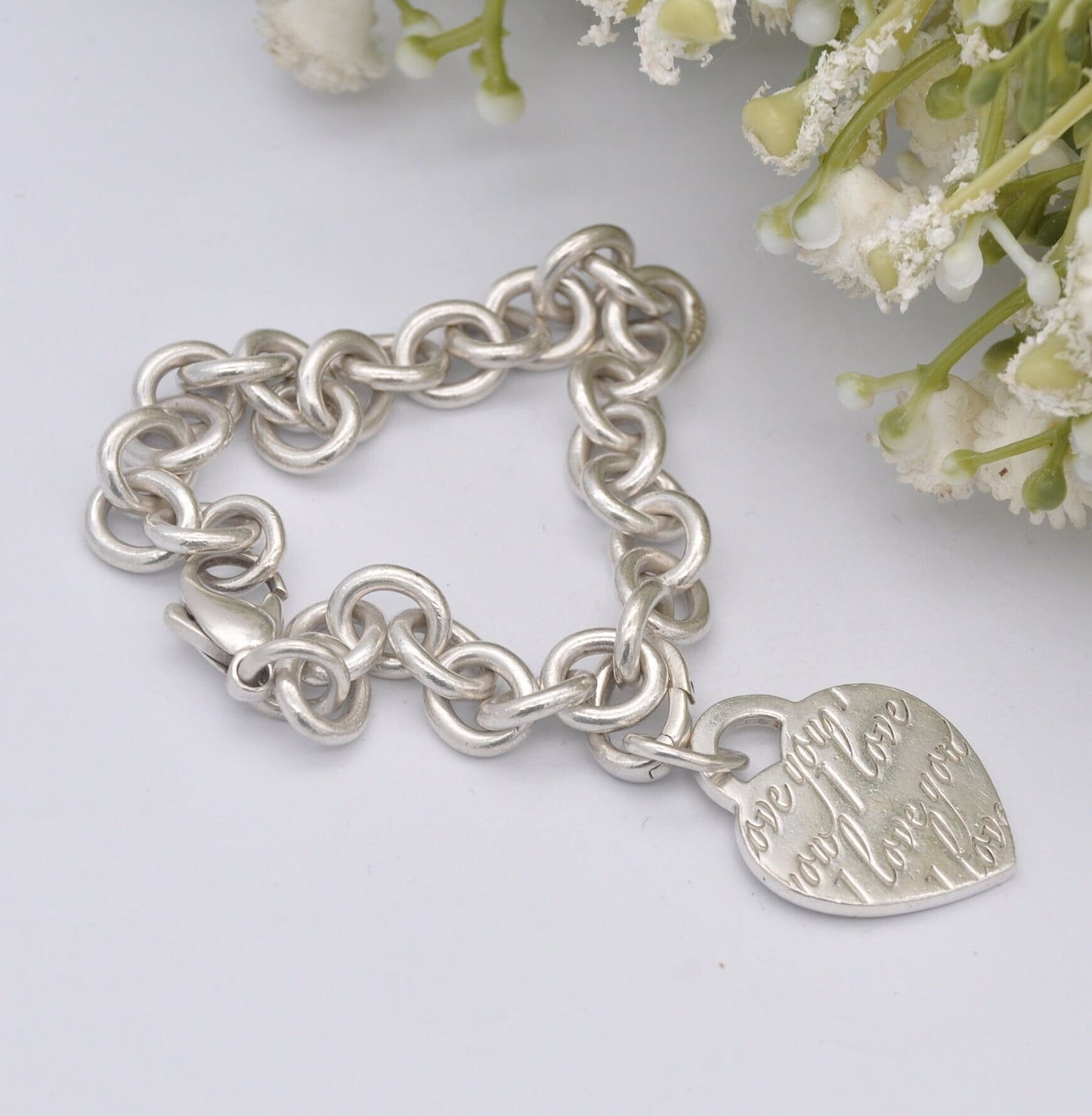 Tiffany & Co Sterling Silver Bracelet with Tiffany Notes I Love You Heart Tag Charm