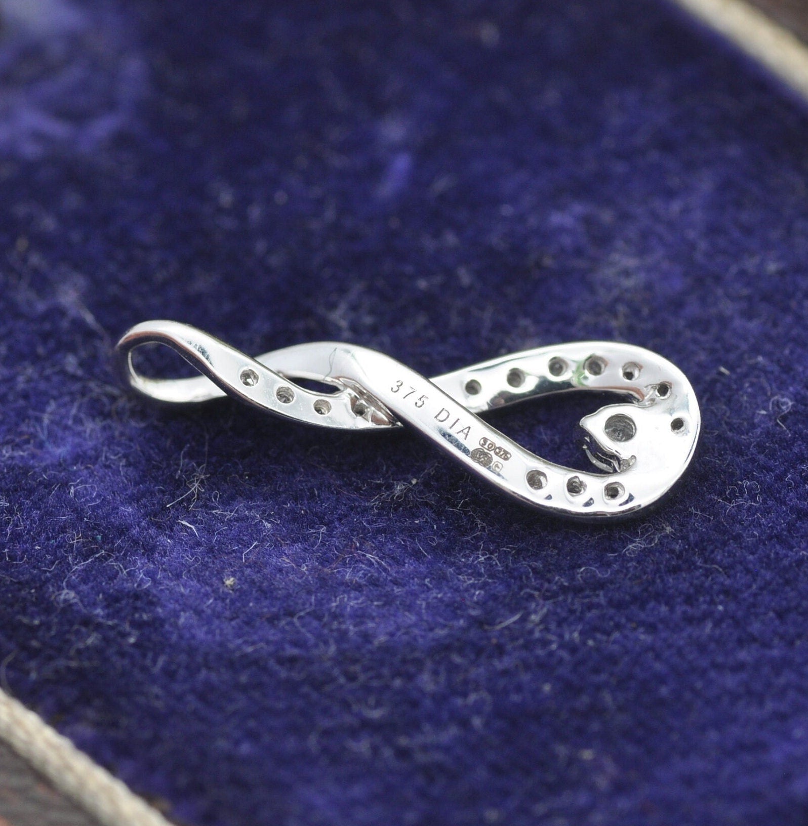 9ct White Gold Diamond Twisted Pendant