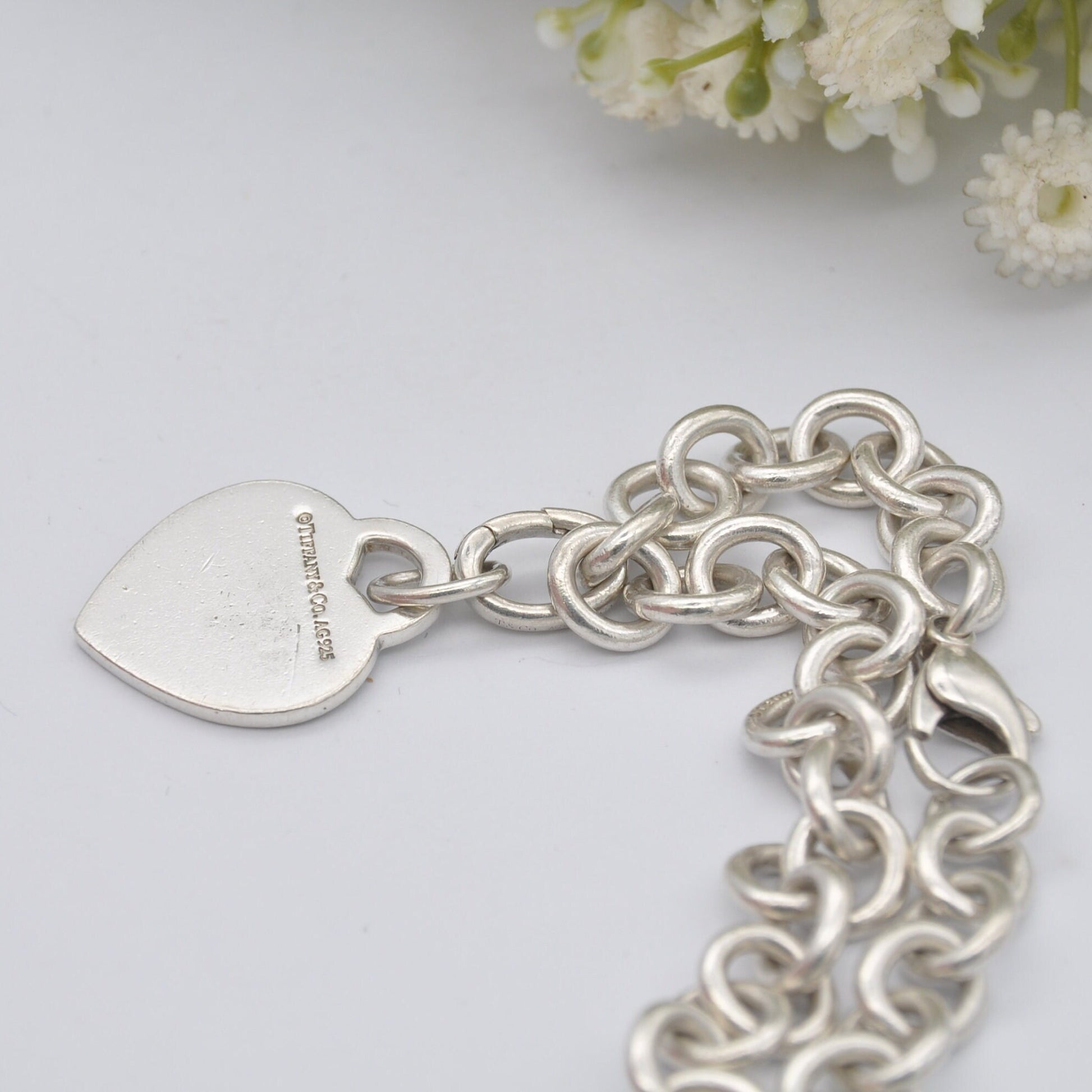 Tiffany & Co Sterling Silver Bracelet with Tiffany Notes I Love You Heart Tag Charm