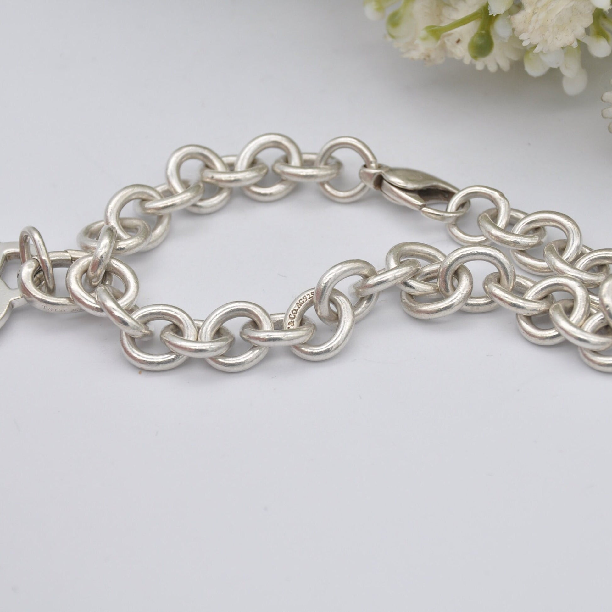 Tiffany & Co Sterling Silver Bracelet with Tiffany Notes I Love You Heart Tag Charm