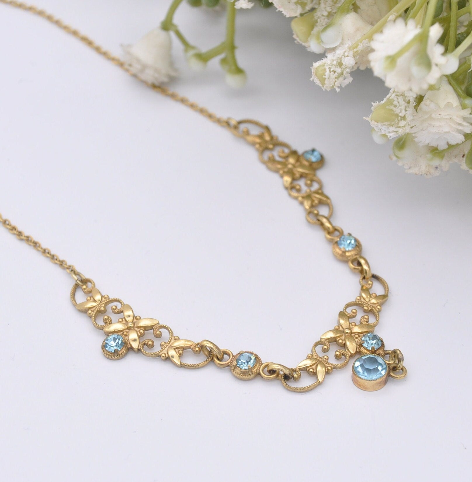 Vintage Andreas Daub Rolled Gold Necklace with Blue Glass Drop Pendant A*D - Ornate Openwork Flower Design