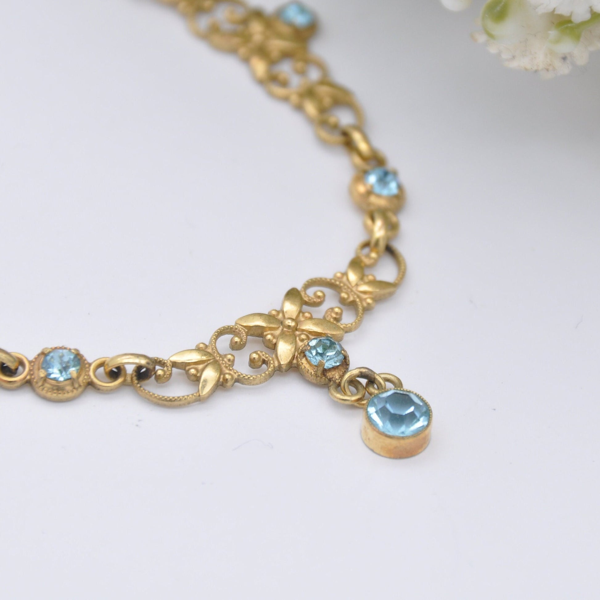 Vintage Andreas Daub Rolled Gold Necklace with Blue Glass Drop Pendant A*D - Ornate Openwork Flower Design