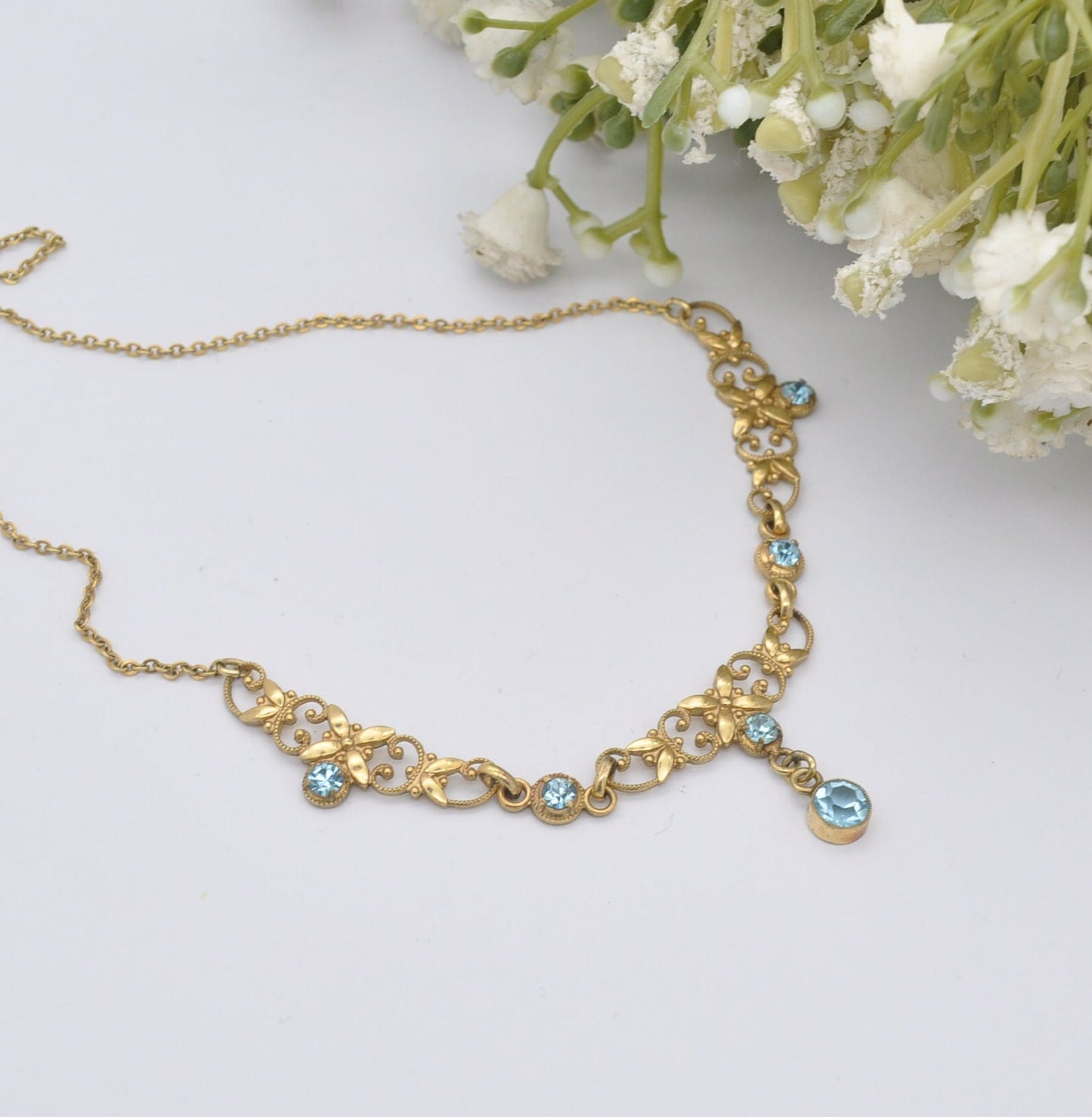 Vintage Andreas Daub Rolled Gold Necklace with Blue Glass Drop Pendant A*D - Ornate Openwork Flower Design