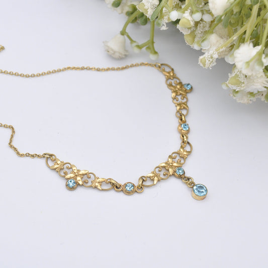 Vintage Andreas Daub Rolled Gold Necklace with Blue Glass Drop Pendant A*D - Ornate Openwork Flower Design