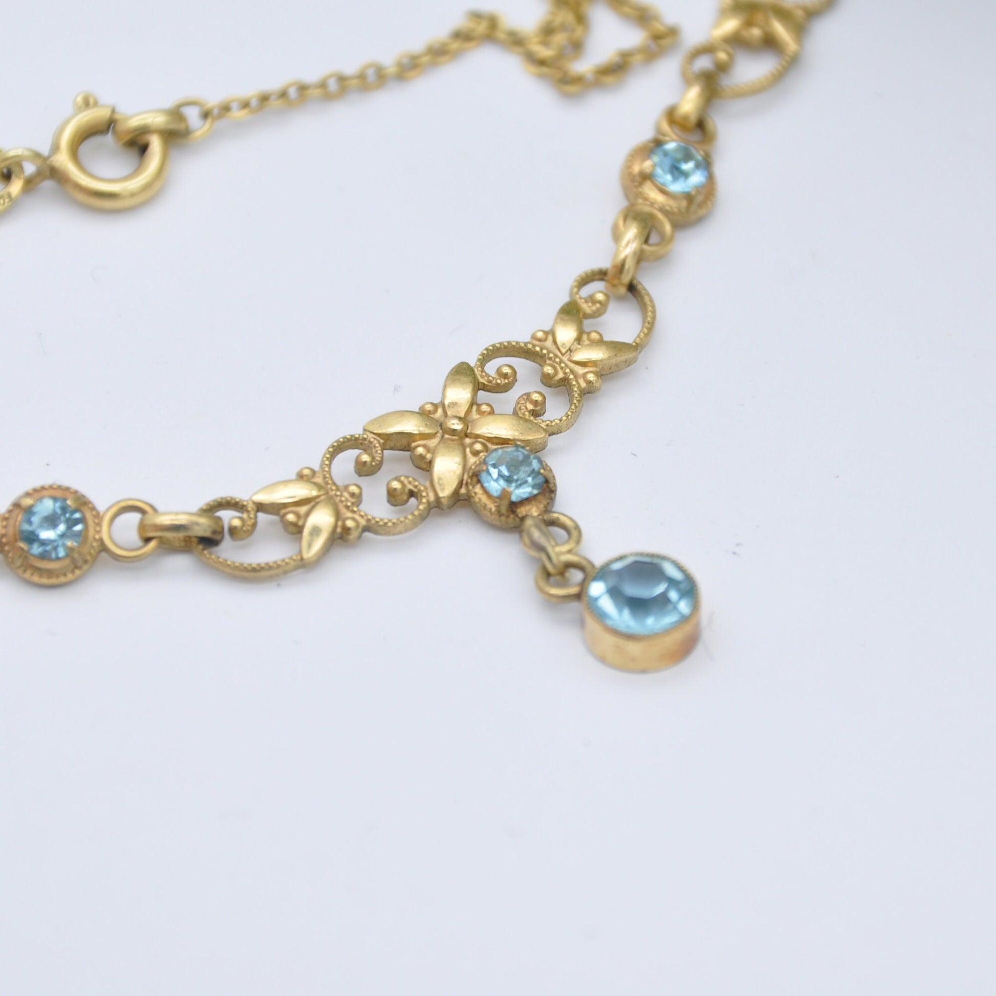 Vintage Andreas Daub Rolled Gold Necklace with Blue Glass Drop Pendant A*D - Ornate Openwork Flower Design