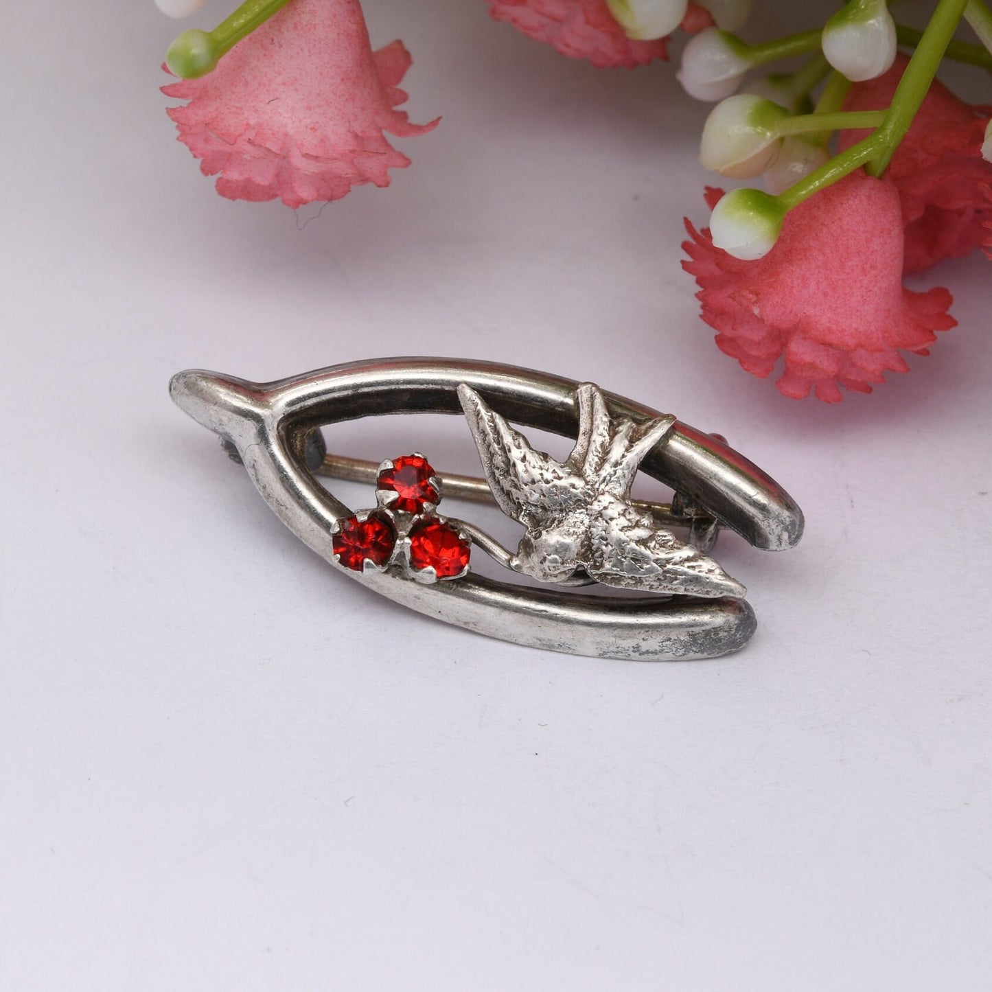 Antique Sterling Silver Bird in a Wishbone Brooch with Red Paste Three Leaf Clover