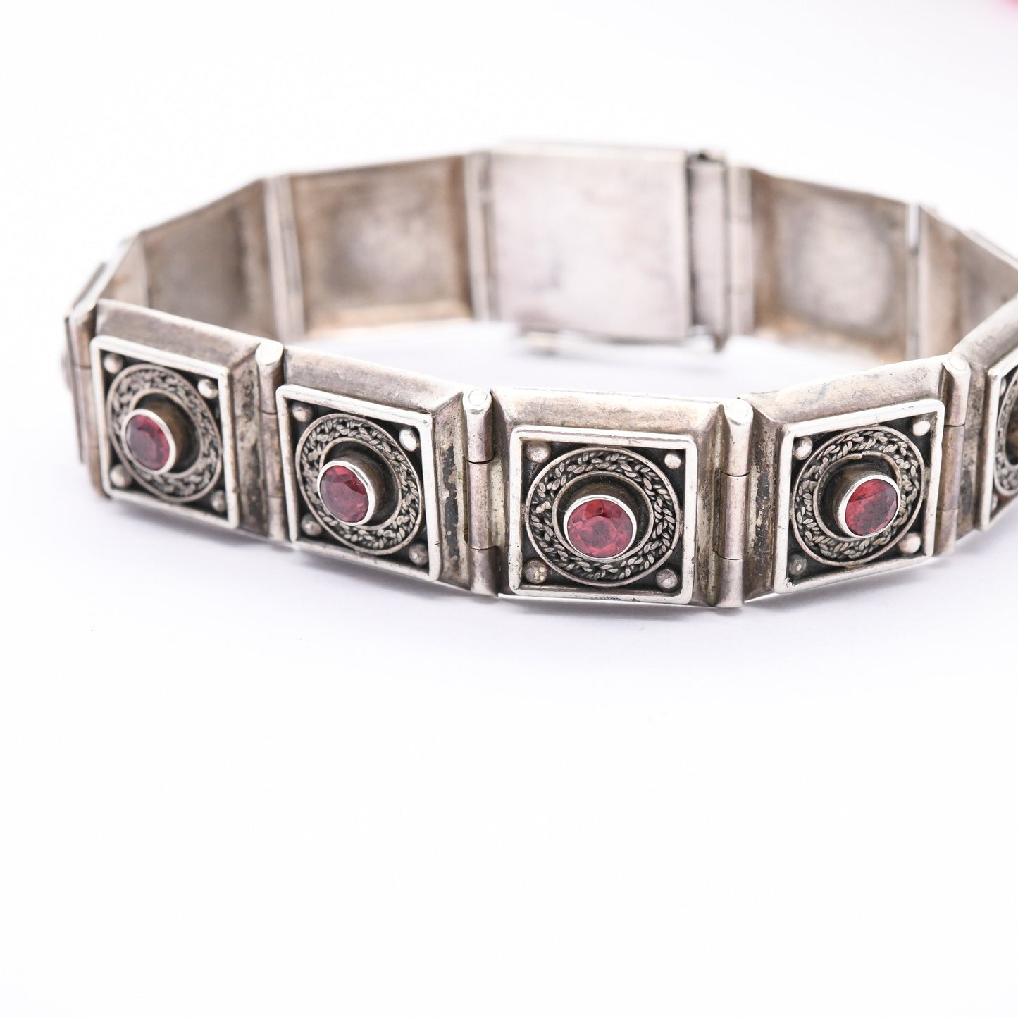 Vintage Sterling Silver Garnet Panel Bracelet with Ornate Rope Design