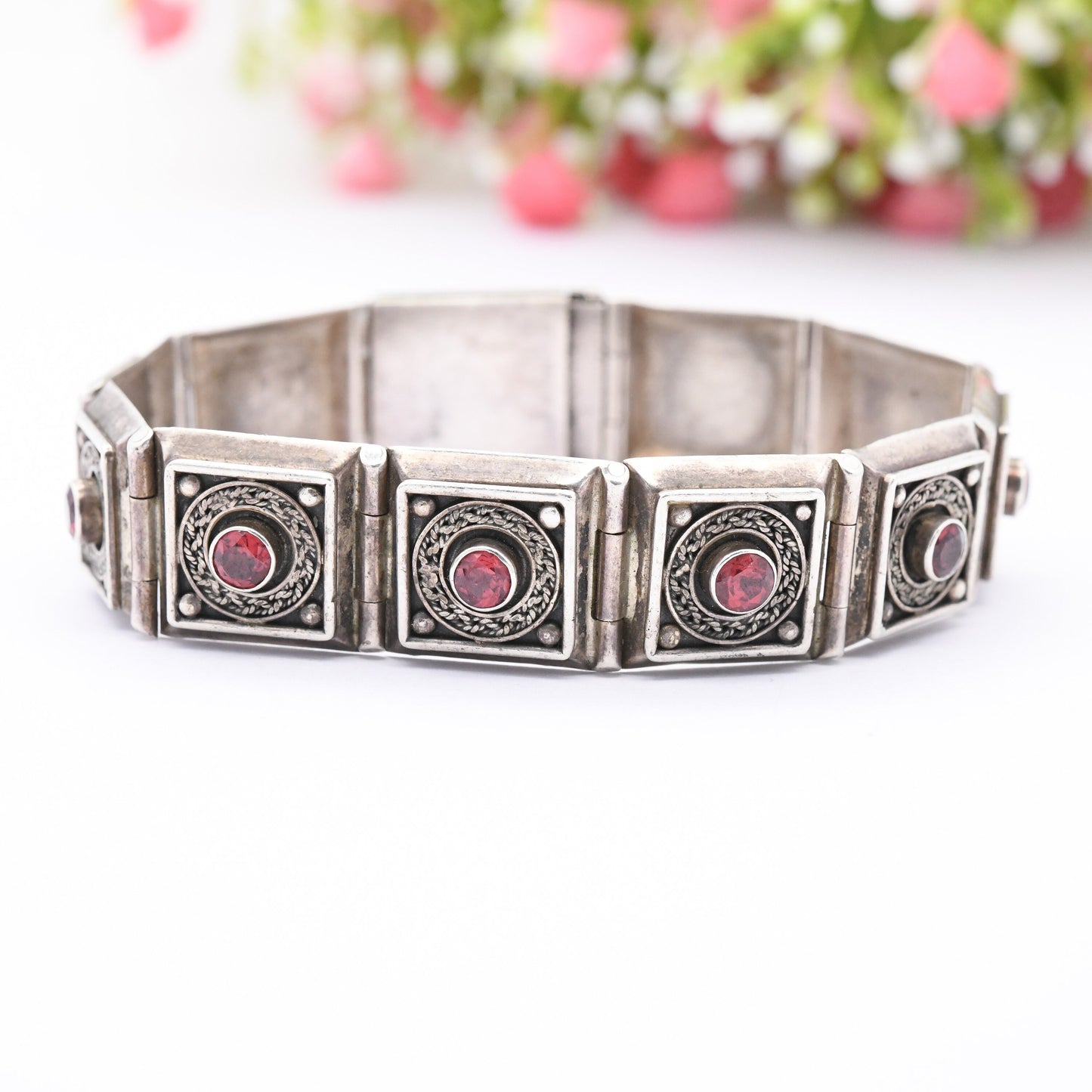 Vintage Sterling Silver Garnet Panel Bracelet with Ornate Rope Design