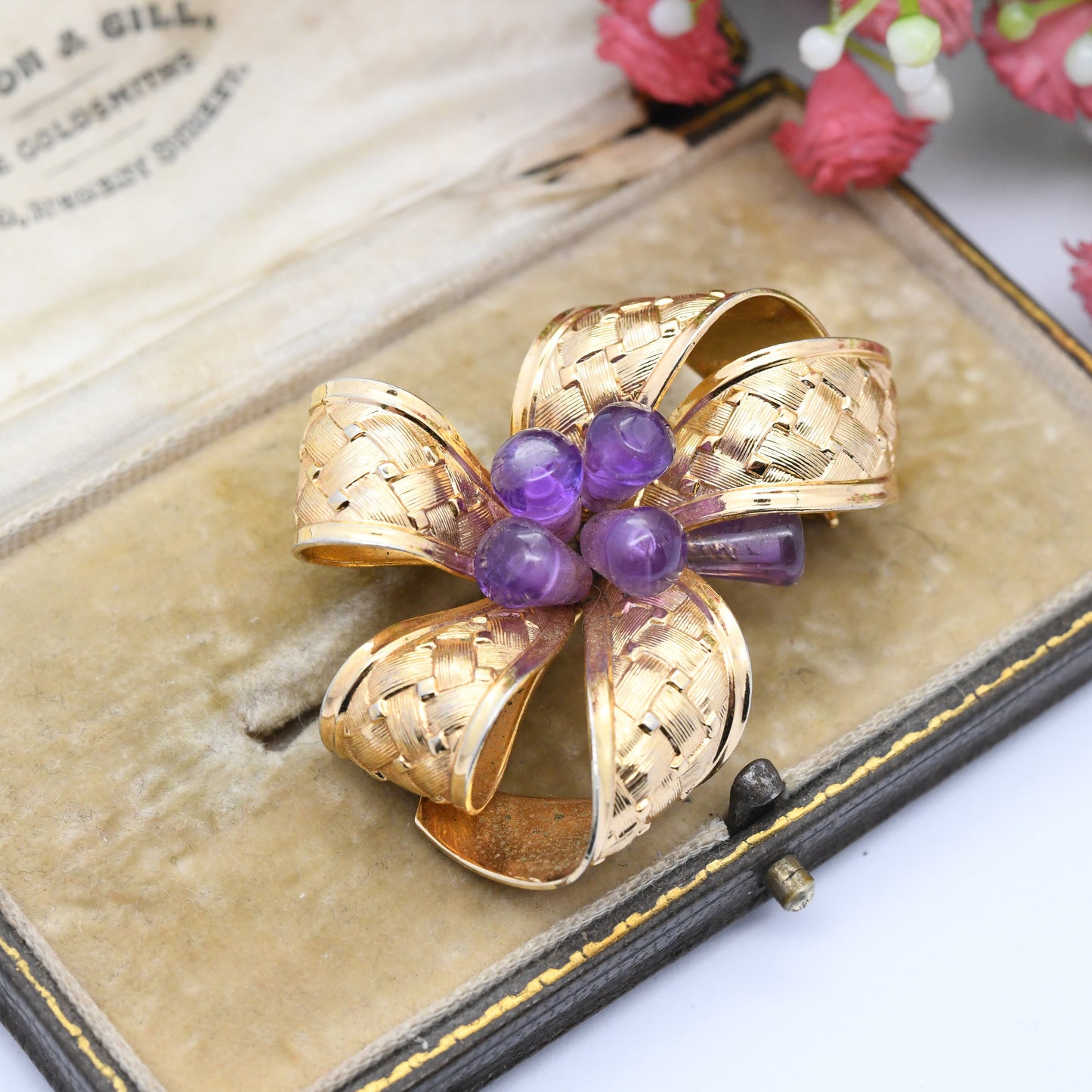 Vintage Grosse Ribbon Brooch with Amethyst Cluster 1968 German Designers - Textured Mid-Century Gold Plated