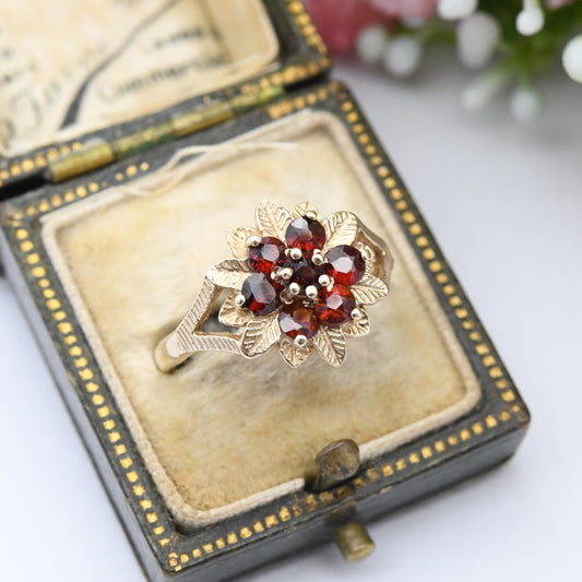 Vintage 9ct Gold Garnet Flower Ring 1979 - Mid-Century Floral Cluster Cocktail Red Gemstones Textured Leaves | UK Size - N 1/2 | US Size - 7