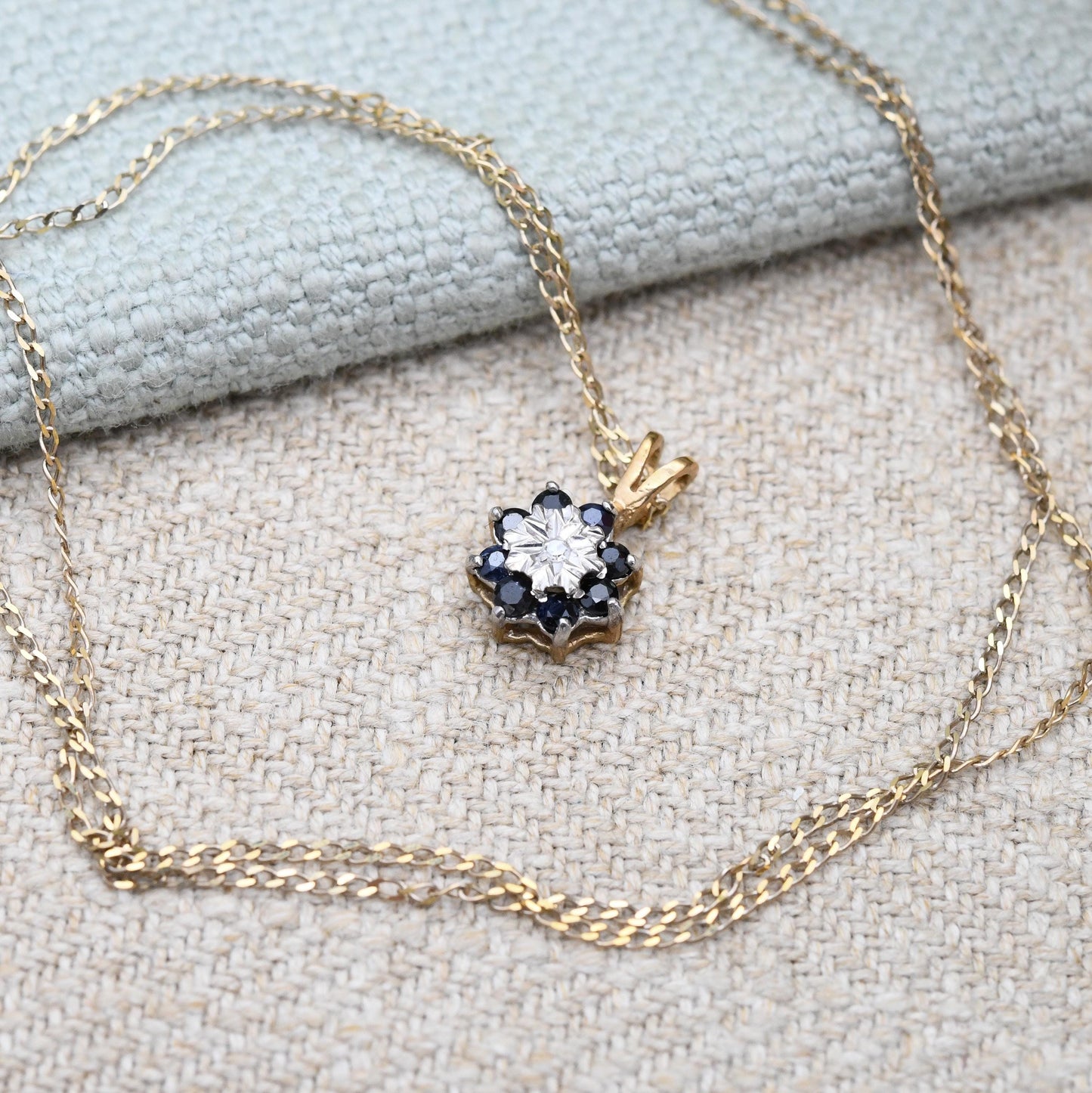 Vintage 9ct Gold Sapphire and Diamond Pendant Necklace Floral Halo 1989 - Mid-Century Miniature Gemstone Charm on a Trace Chain Blue & White