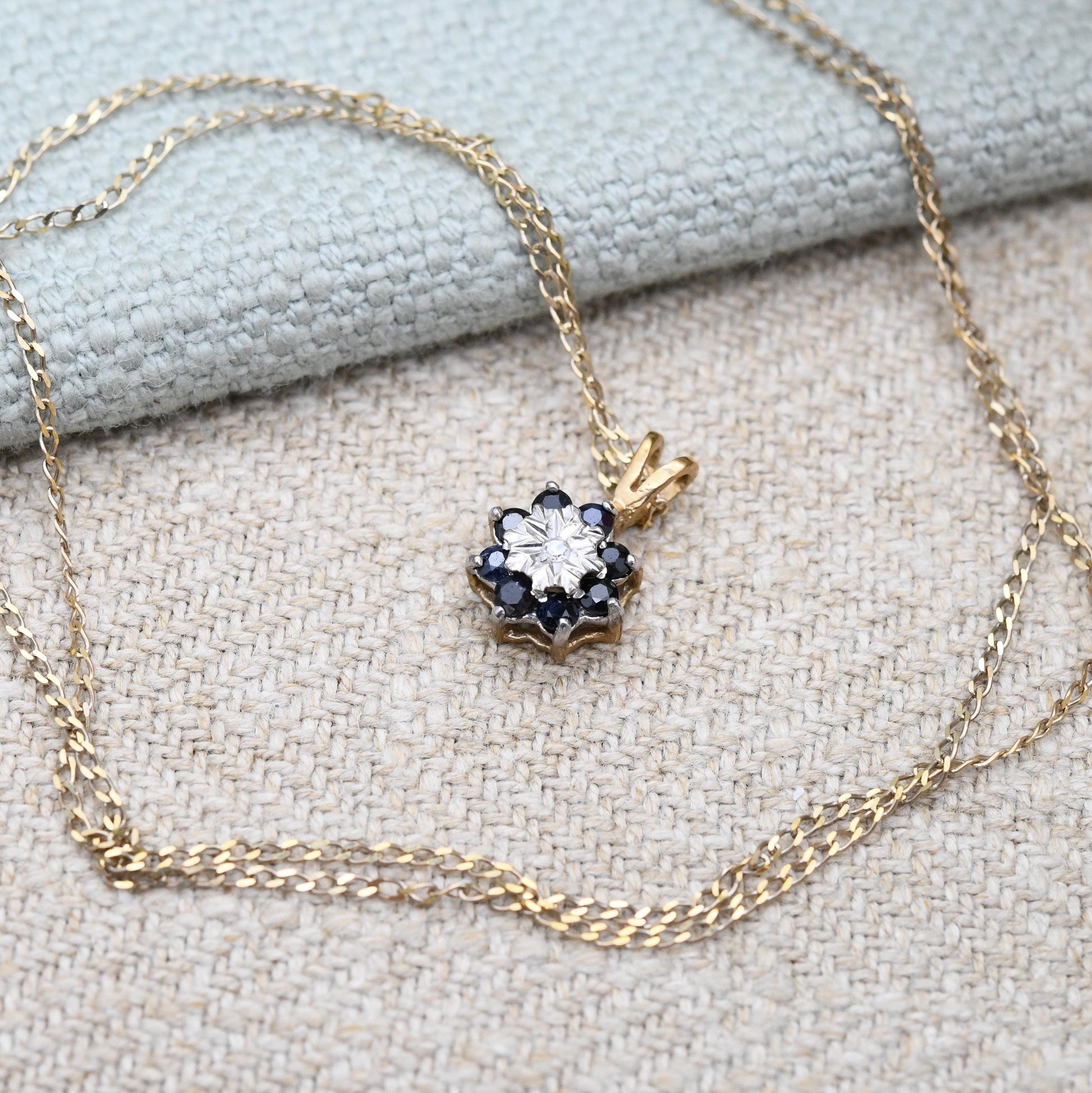 Vintage 9ct Gold Sapphire and Diamond Pendant Necklace Floral Halo 1989 - Mid-Century Miniature Gemstone Charm on a Trace Chain Blue & White