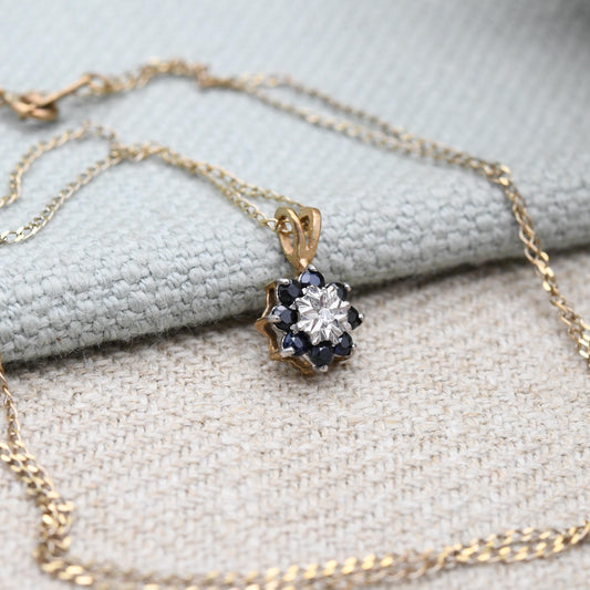 Vintage 9ct Gold Sapphire and Diamond Pendant Necklace Floral Halo 1989 - Mid-Century Miniature Gemstone Charm on a Trace Chain Blue & White