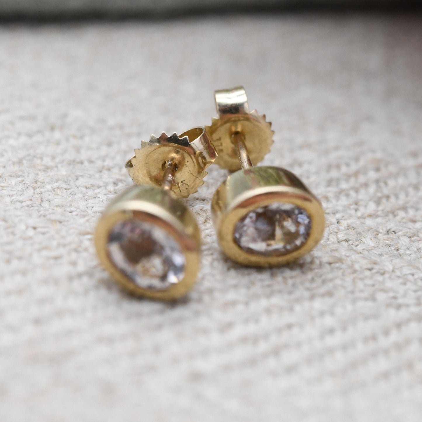 9ct Gold Stud Earrings with Bezel Set Oval Clear Stone - Y2K Pretty Yellow Gold | Faceted Sparkly Stone | with Butterfly Backs | UK Hallmark