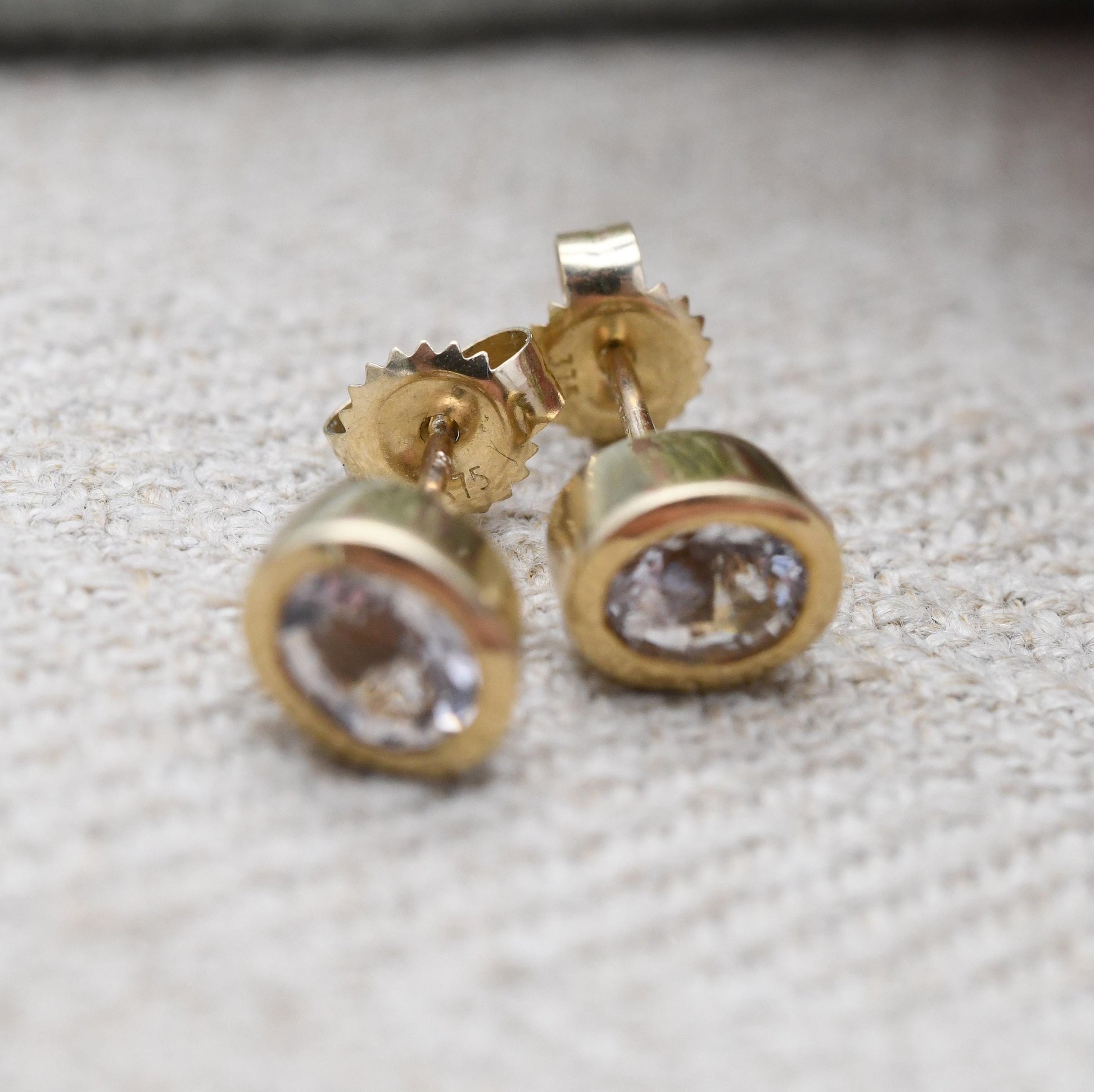 9ct Gold Stud Earrings with Bezel Set Oval Clear Stone - Y2K Pretty Yellow Gold | Faceted Sparkly Stone | with Butterfly Backs | UK Hallmark