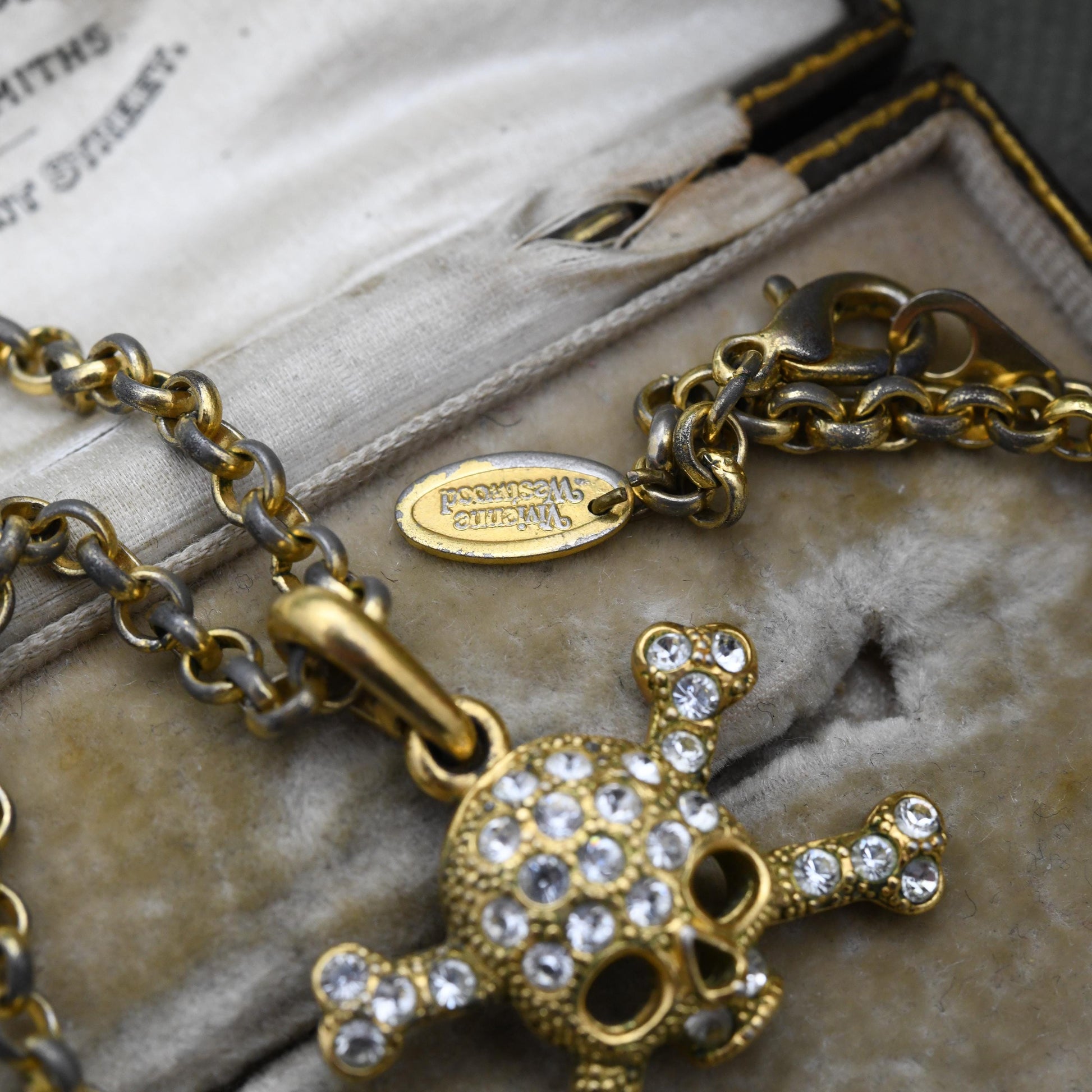 Vintage Vivienne Westwood Gold Plated Crystal Skull and Crossbones Pendant Necklace - c. Y2K Branded Costume Jewellery