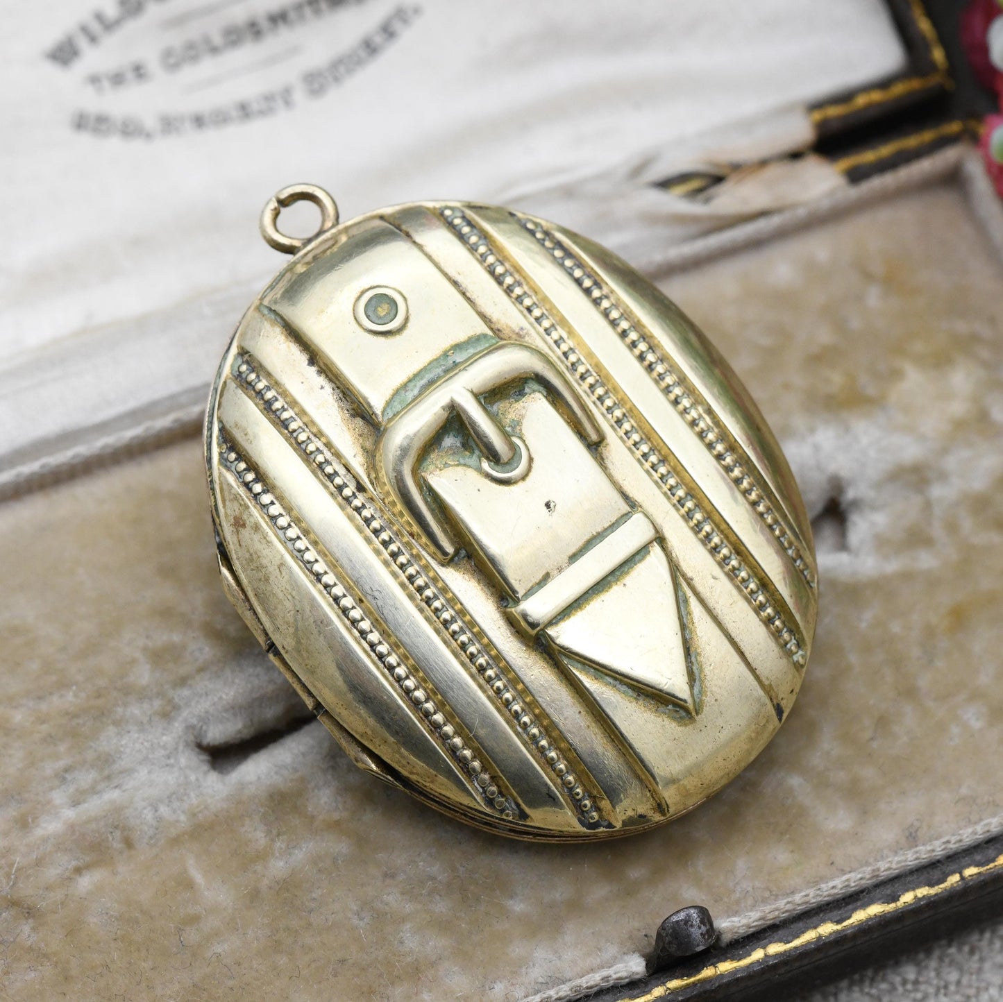 Antique Victorian Locket with Raised Buckle Design - Sentimental Symbol of Eternity Strength Protection