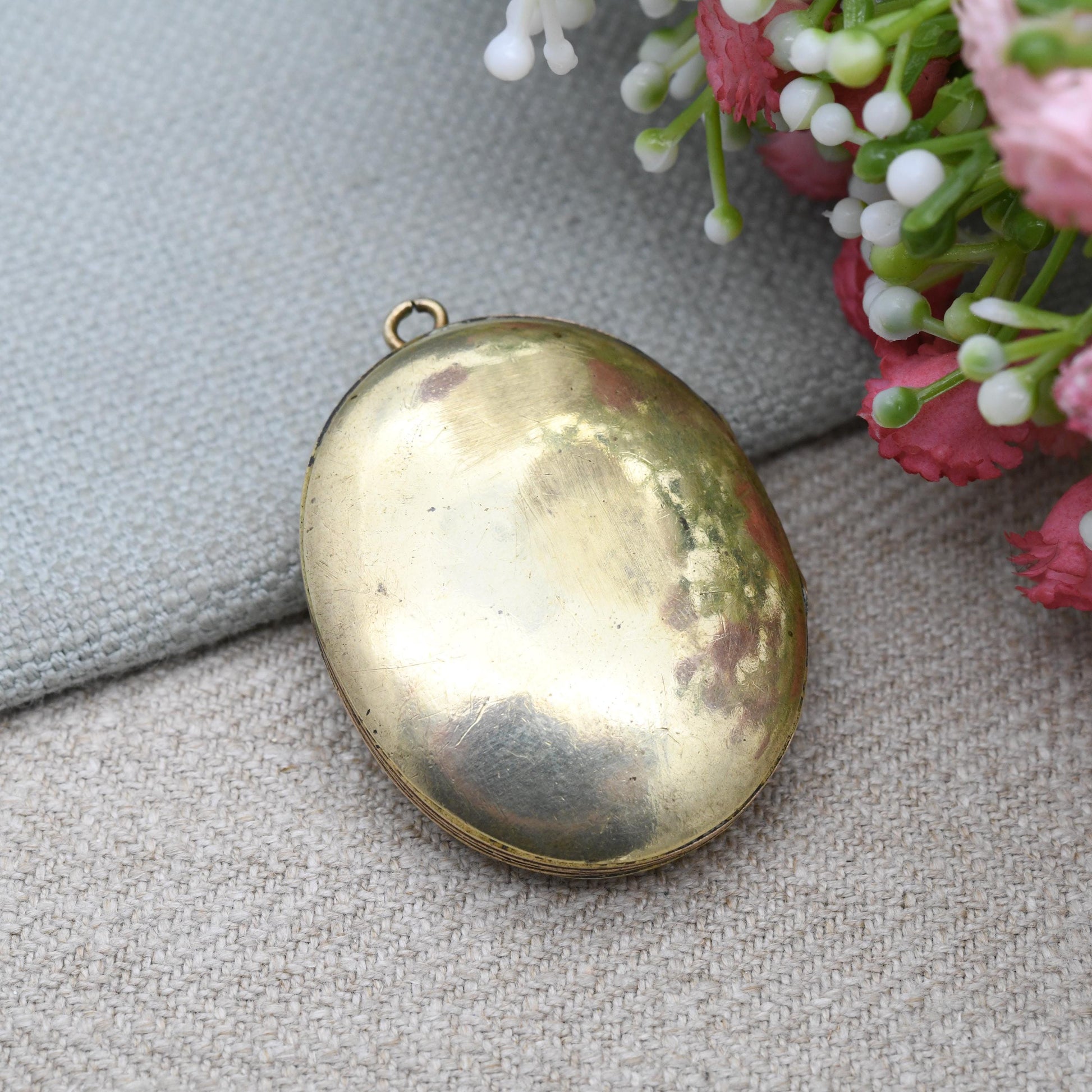 Antique Victorian Locket with Raised Buckle Design - Sentimental Symbol of Eternity Strength Protection