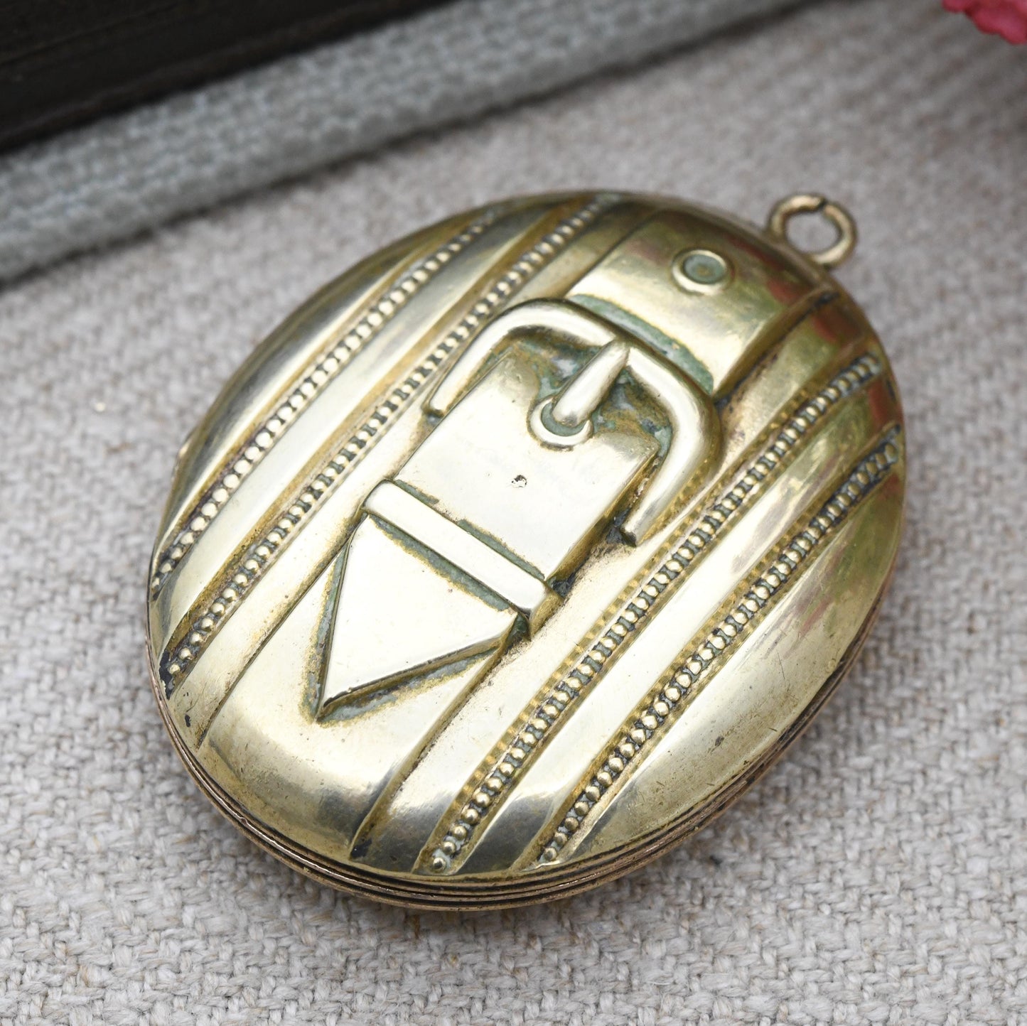 Antique Victorian Locket with Raised Buckle Design - Sentimental Symbol of Eternity Strength Protection
