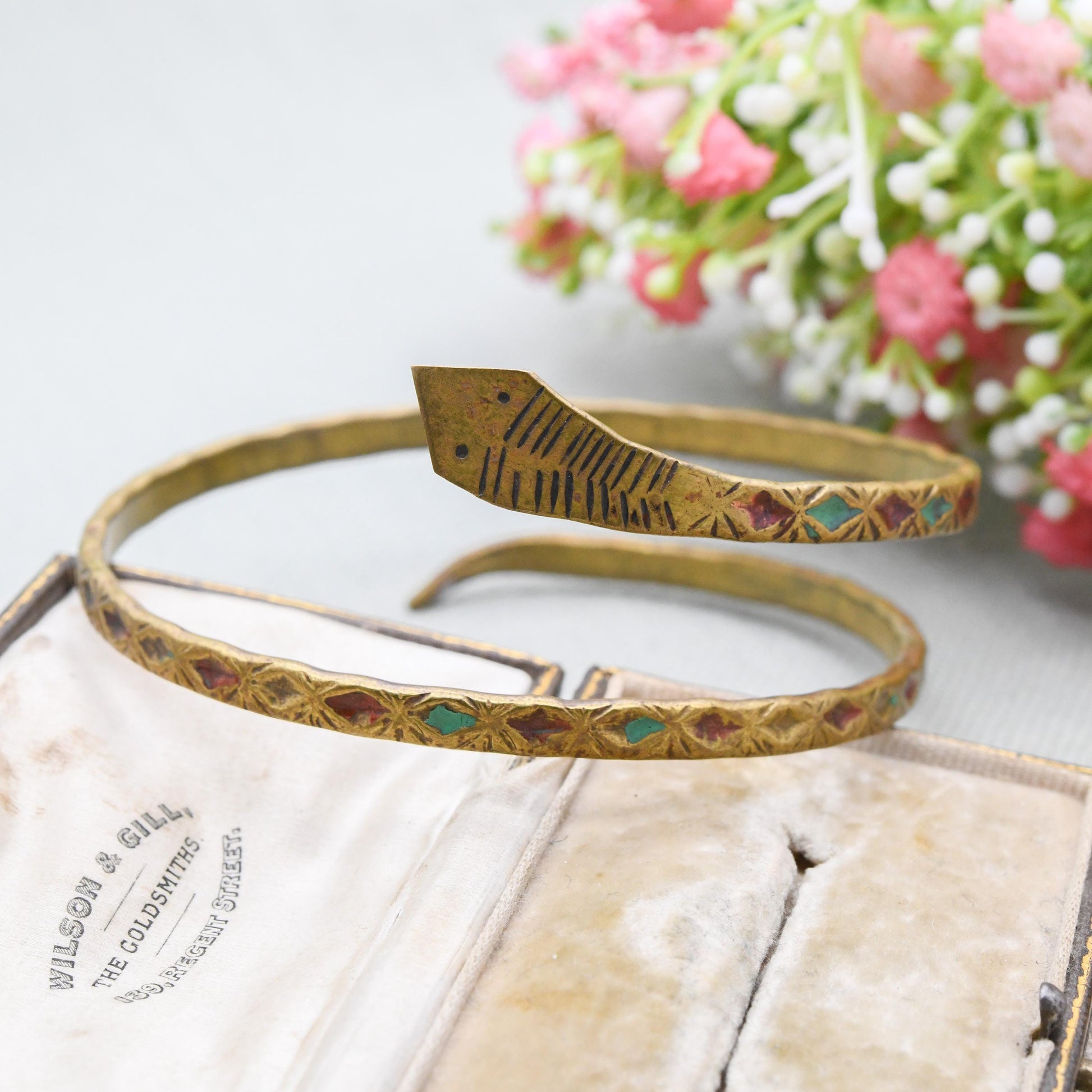Antique Art Deco Egyptian Revival Coiled Snake Bangle or Armlet with Blue and Red Enamel