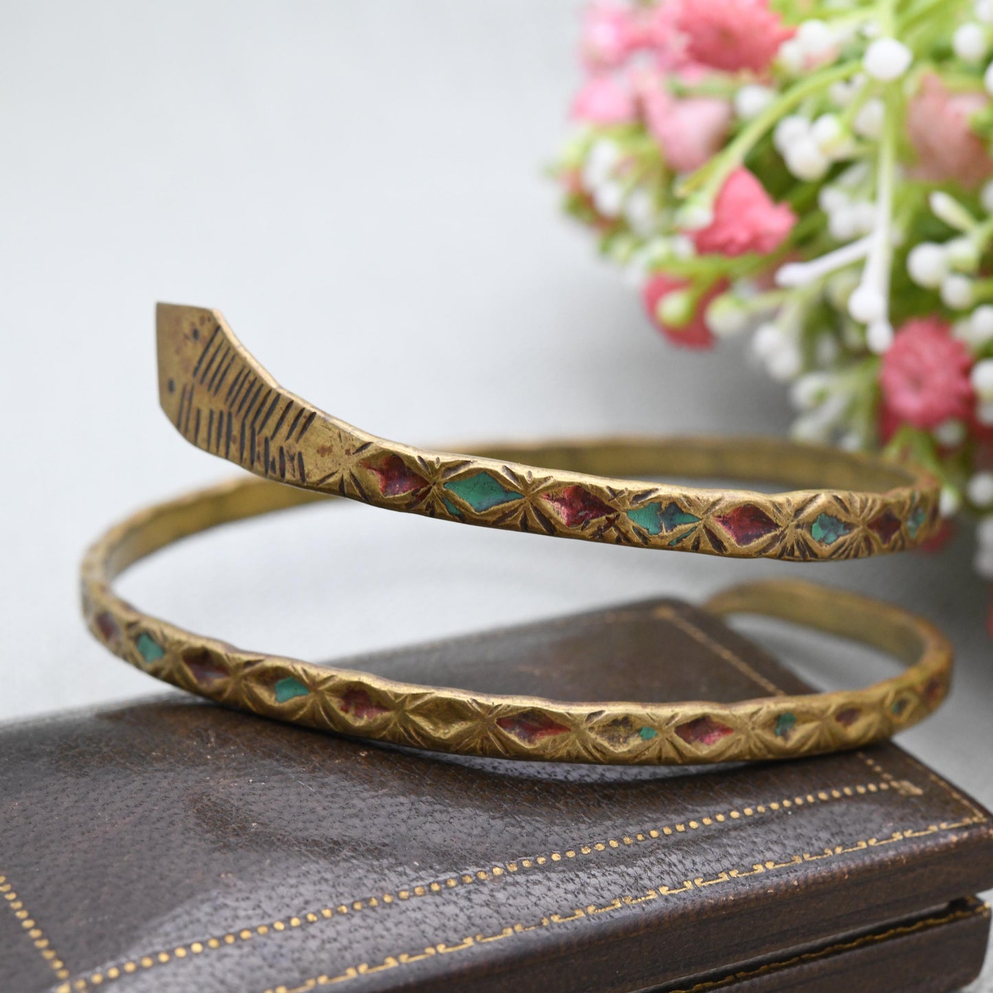 Antique Art Deco Egyptian Revival Coiled Snake Bangle or Armlet with Blue and Red Enamel