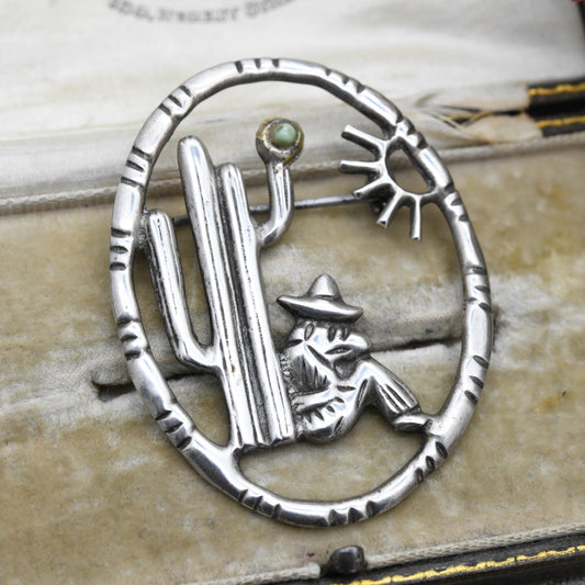 Vintage Mexican Silver Cactus and Man Openwork Brooch with Green Gemstone