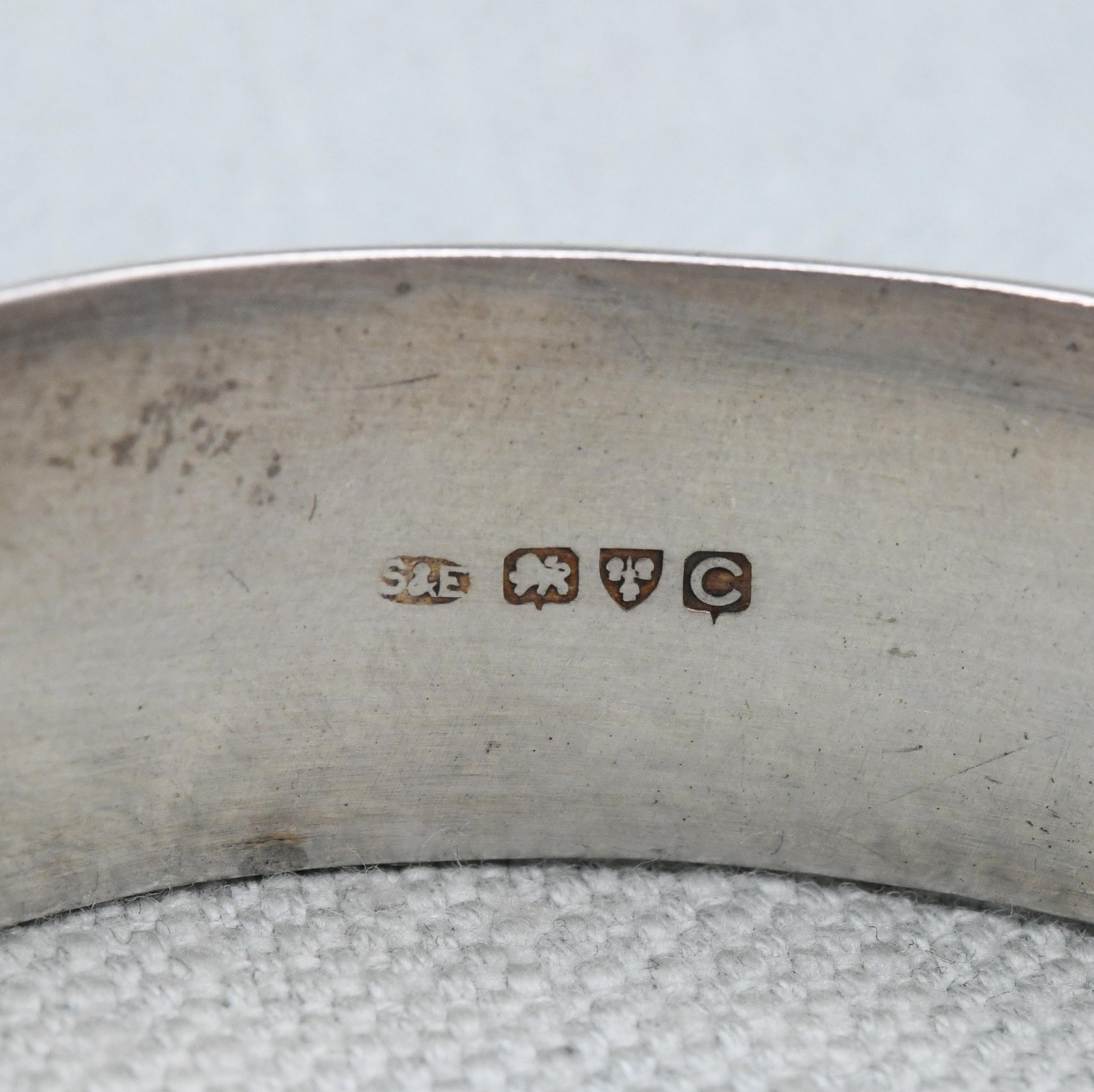 Vintage Sterling Silver Engraved Bangle Bracelet 1953 by Smith & Ewen - Chunky Victorian Aesthetic Scrolling Style with Safety Chain