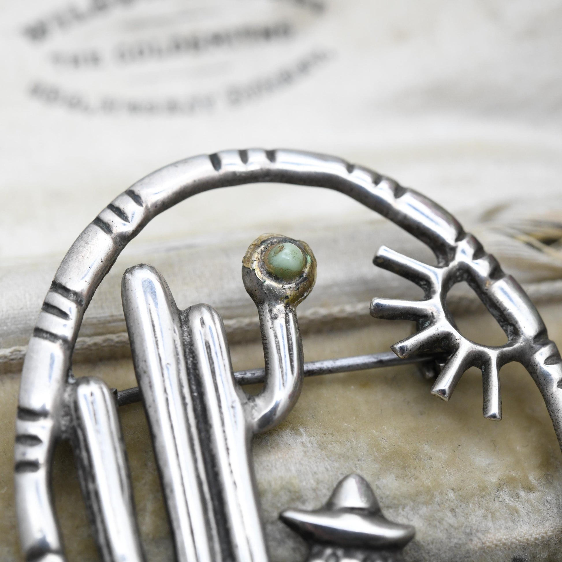 Vintage Mexican Silver Cactus and Man Openwork Brooch with Green Gemstone