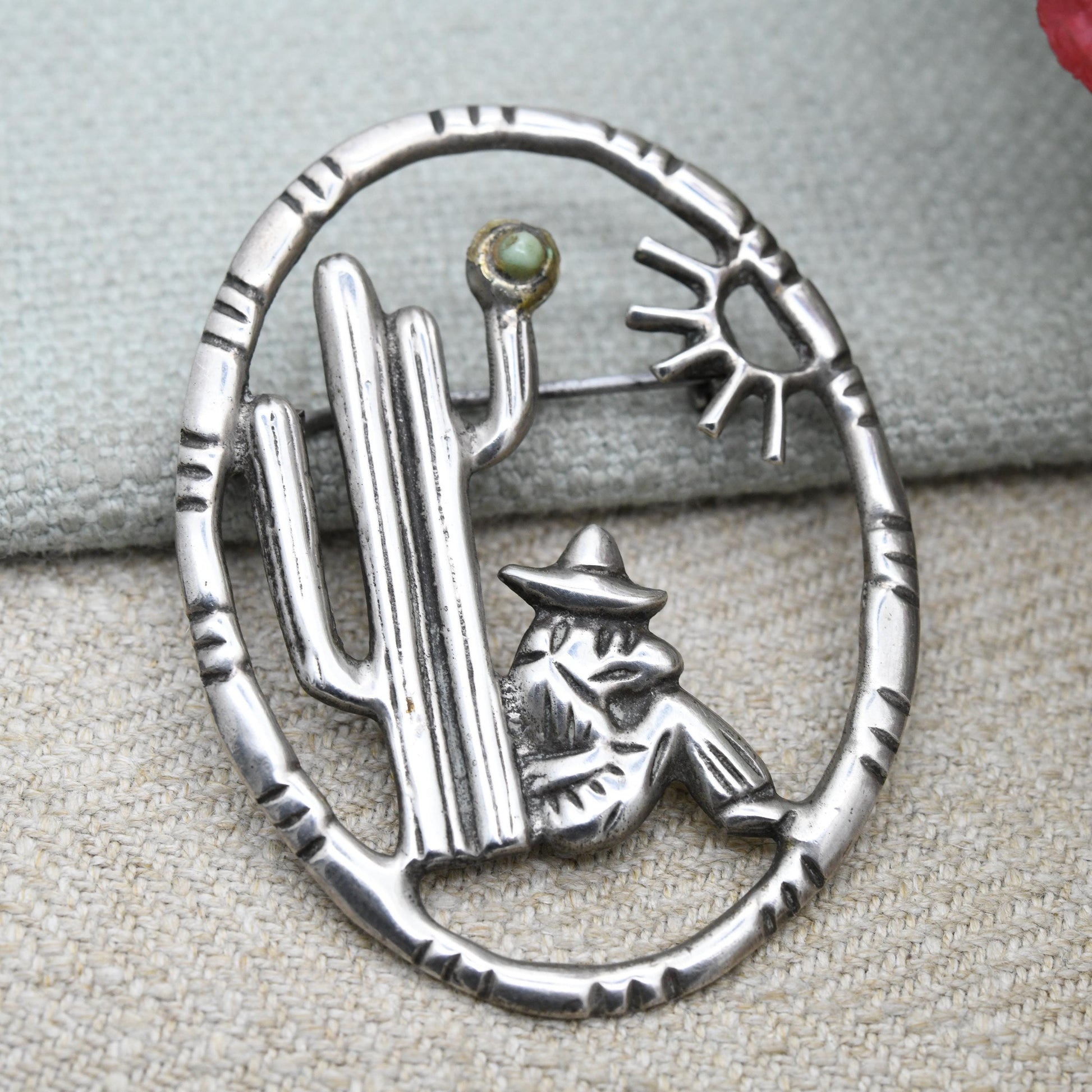Vintage Mexican Silver Cactus and Man Openwork Brooch with Green Gemstone