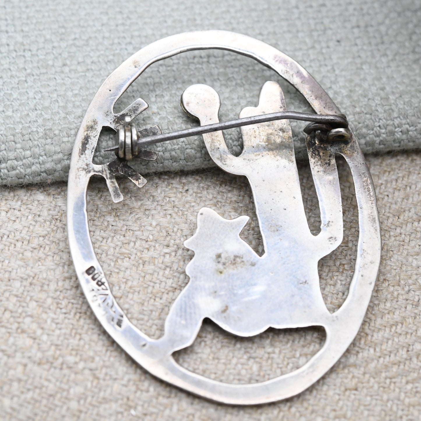 Vintage Mexican Silver Cactus and Man Openwork Brooch with Green Gemstone