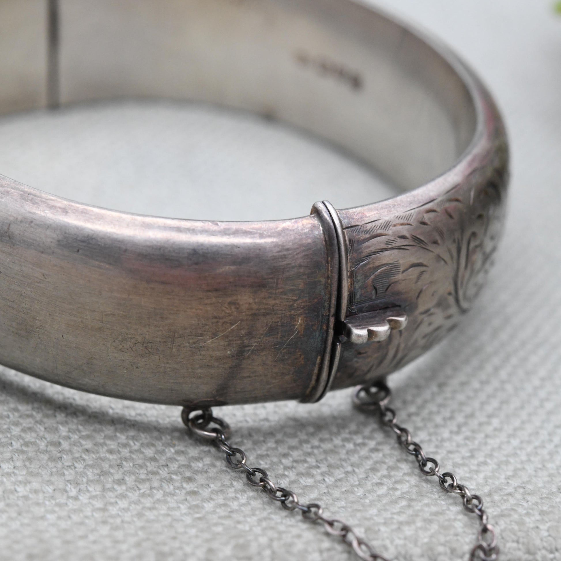Vintage Sterling Silver Engraved Bangle Bracelet 1953 by Smith & Ewen - Chunky Victorian Aesthetic Scrolling Style with Safety Chain