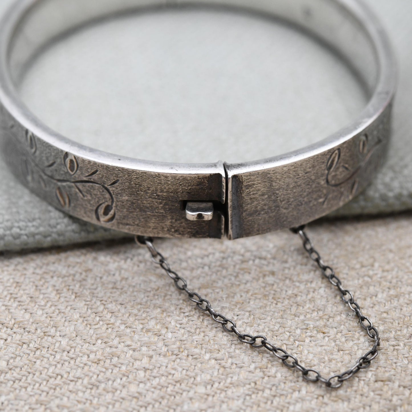 Vintage Sterling Silver Floral Engraved Bangle Bracelet 1970 - Chunky Victorian Aesthetic Scrolling Style with Safety Chain