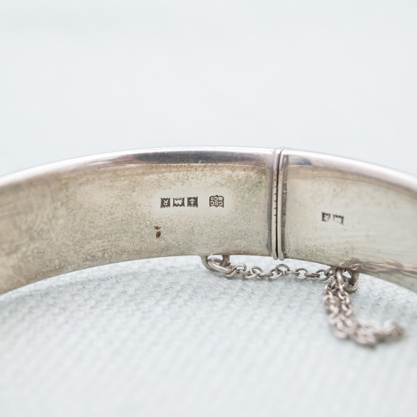 Vintage Sterling Silver Floral Engraved Bangle Bracelet 1966 - Chunky Victorian Aesthetic Scrolling Style with Safety Chain