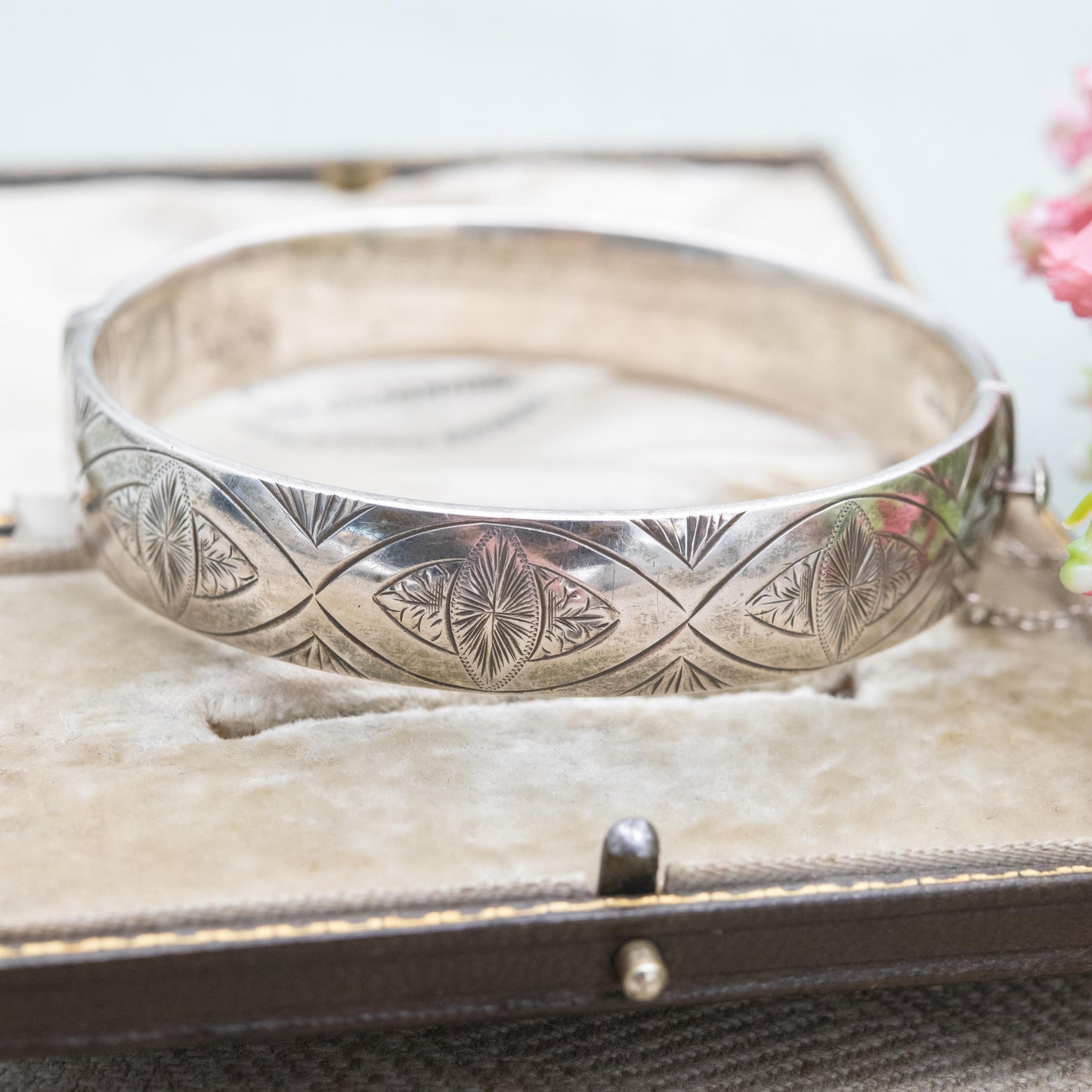 Vintage Sterling Silver Floral Engraved Bangle Bracelet 1966 - Chunky Victorian Aesthetic Scrolling Style with Safety Chain