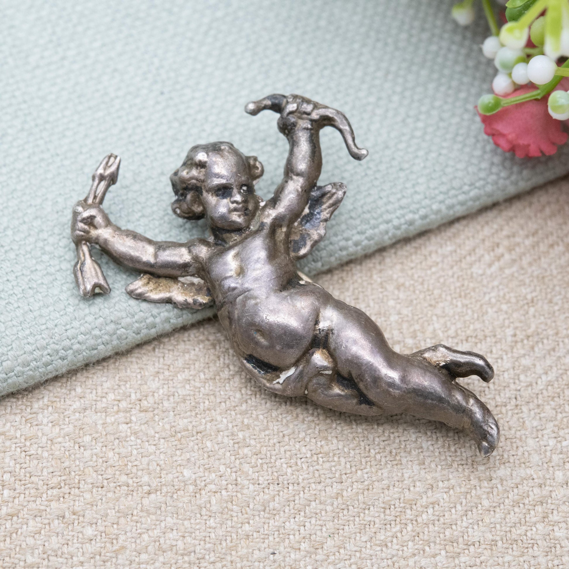 Antique Art Nouveau Repoussé Cherub Brooch c. 1900 - Winged Cupid with Bow and Arrows
