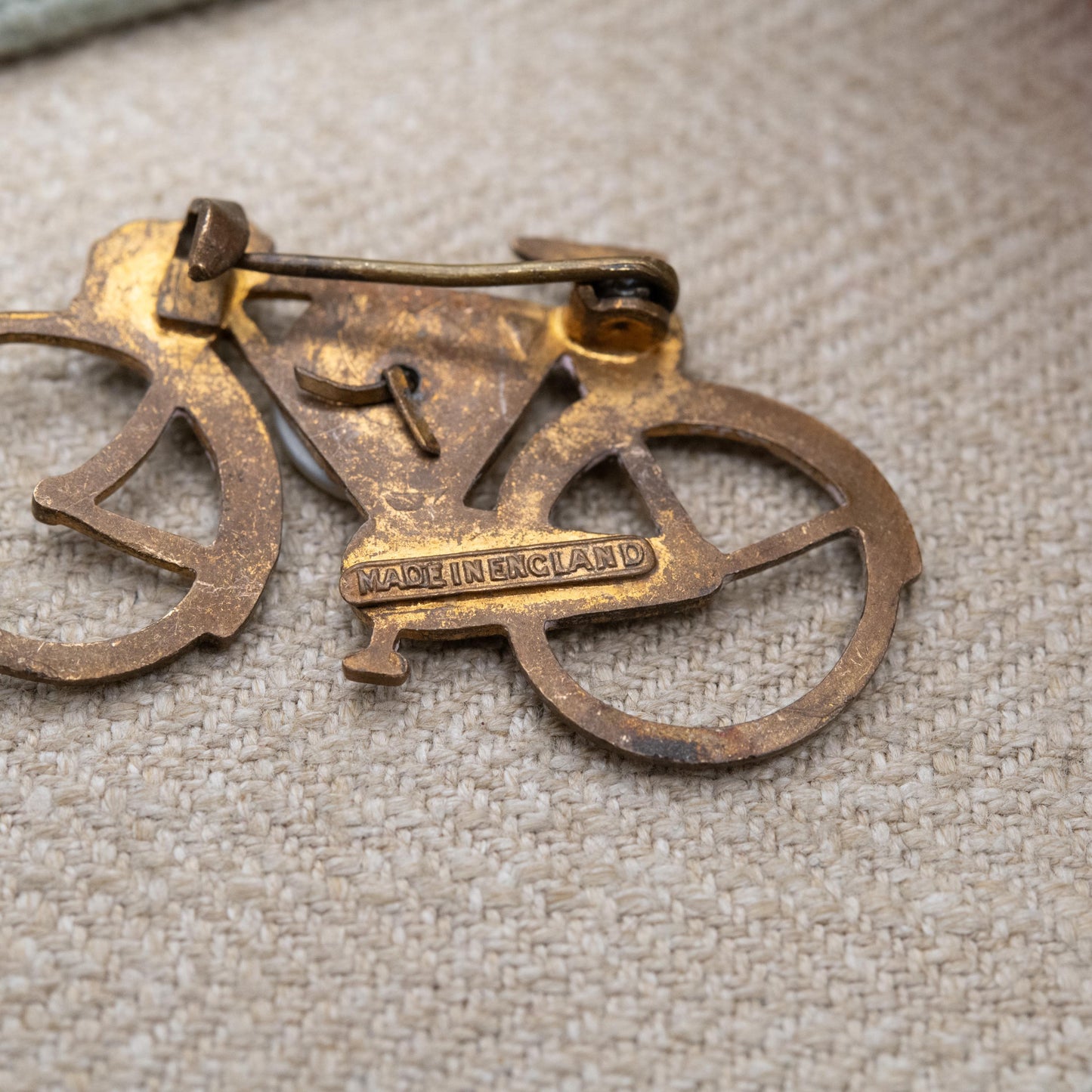 Antique Bicycle Brooch with Mother of Pearl Shamrock c. 1920s Made in England