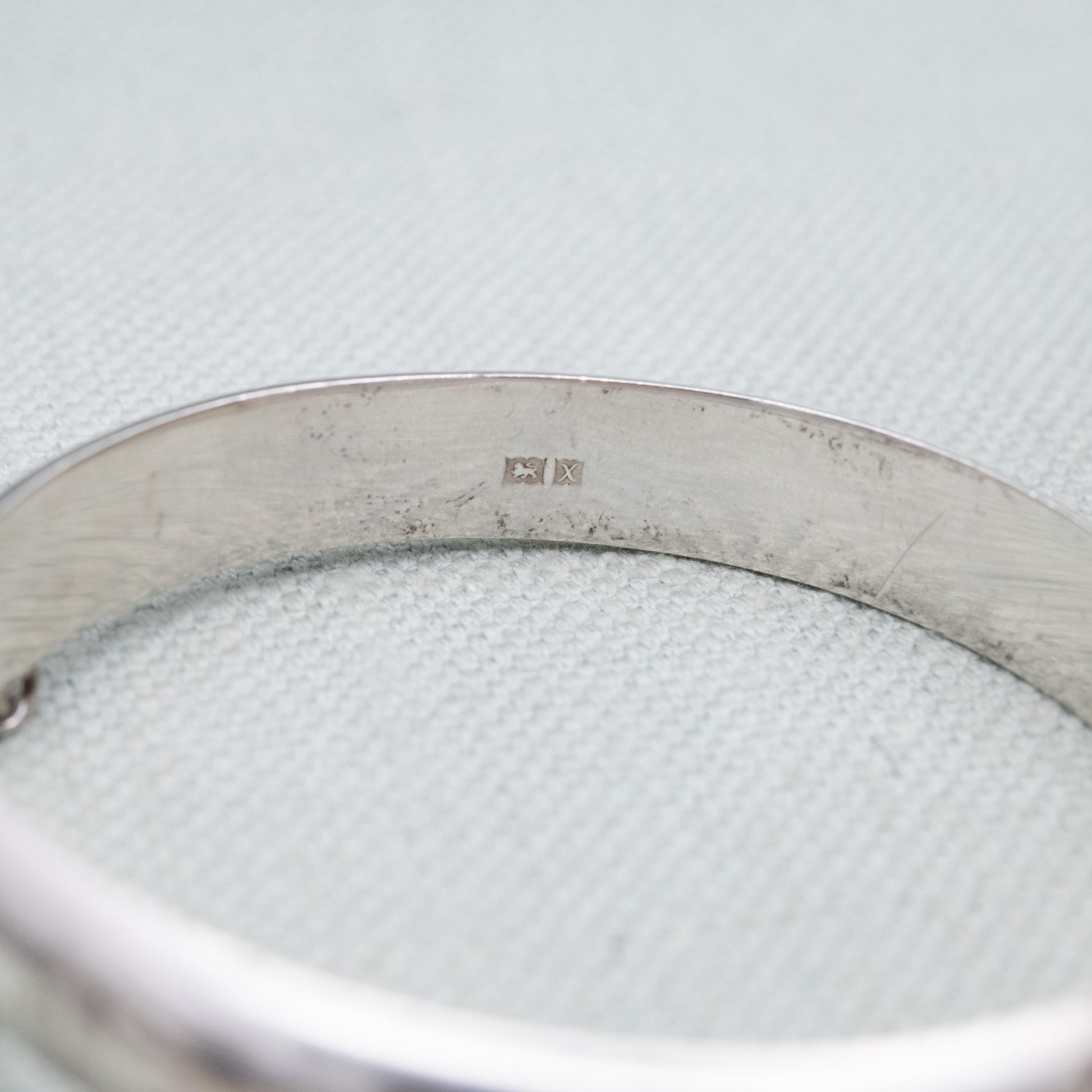 Vintage Sterling Silver Floral Engraved Bangle Bracelet 1972 - Textured Victorian Aesthetic Scrolling Style with Safety Chain